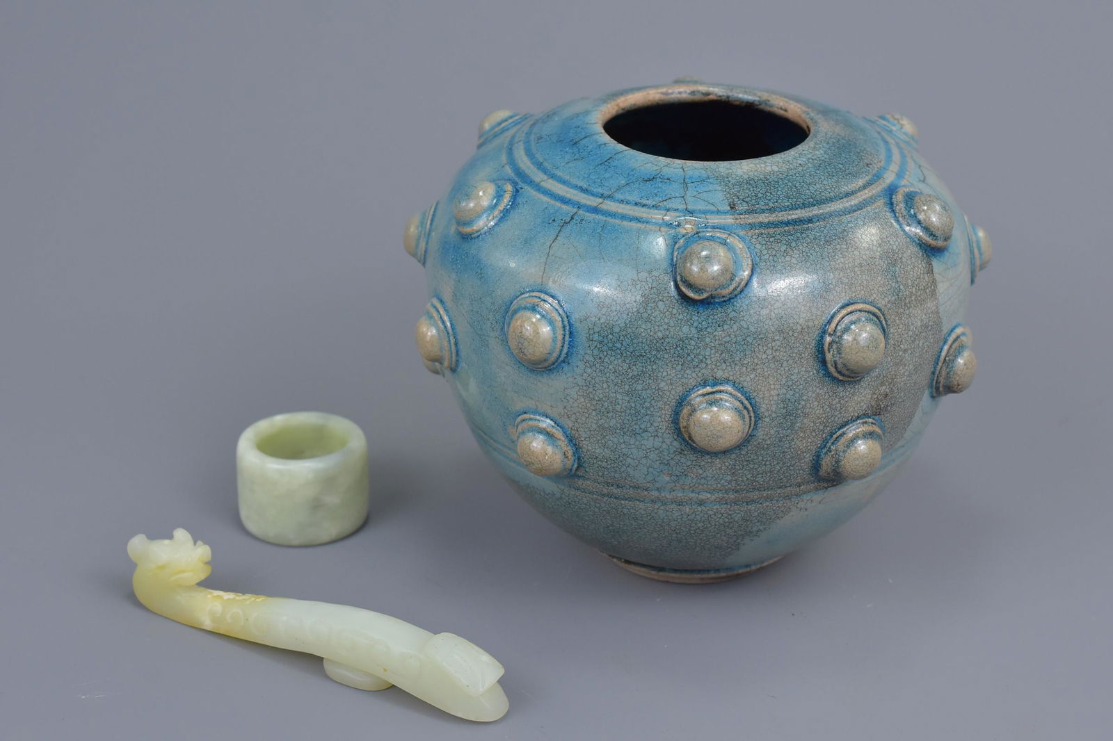 An Asian blue glazed pottery jar with studded (1 of 6)