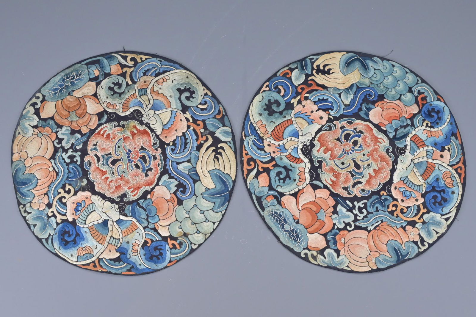 A pair of chinese silk embroideries. diameter approx. (1 of 5)