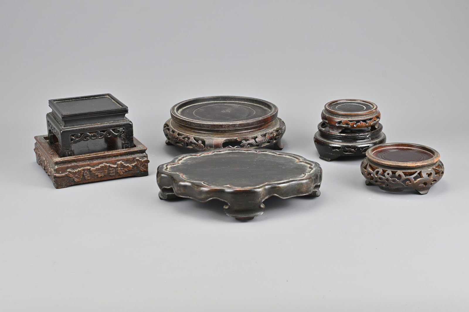 Seven Various Chinese Carved Wooden Stands (1 of 3)