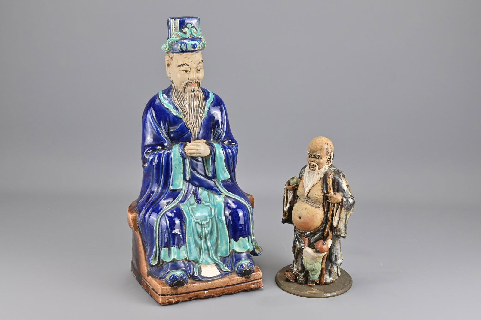 A Chinese Blue Glazed Seated Figure of A Scholar (1 of 4)