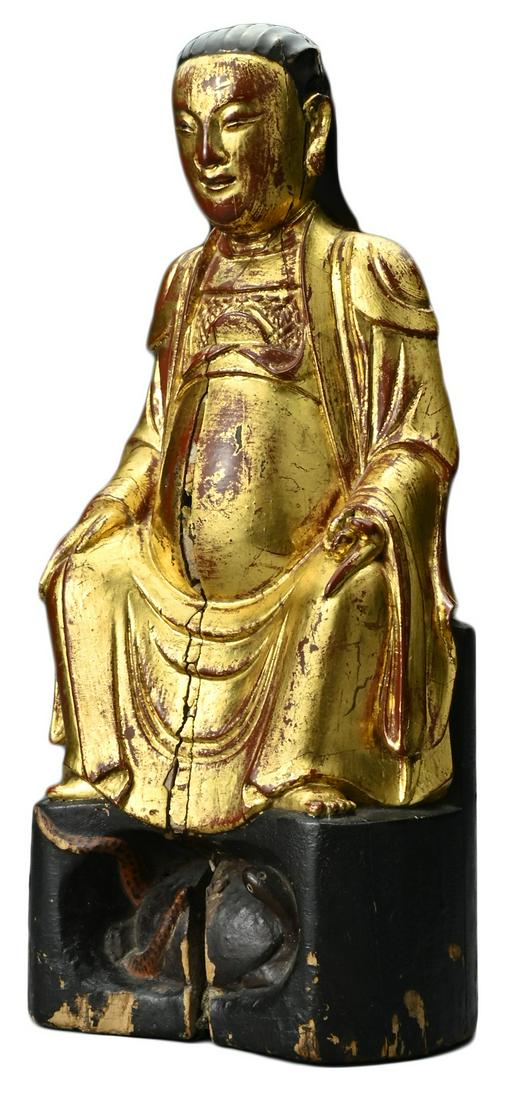 A Chinese red lacquer and gilt carved wooden seated (1 of 11)