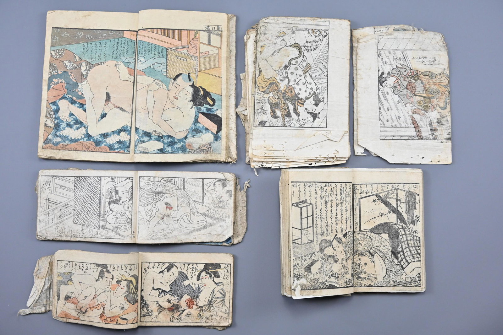 Five Japanese 17th, 18th & 19th Century Shunga (Erotic): Five Japanese 17th, 18th & 19th Century Shunga (Erotic) Woodblock Printed Books containing both images and erotic text. Some images have contemporary hand colouring, one has colour-printed illustratio