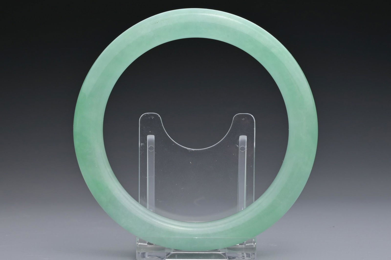 A CHINESE JADEITE CYLINDRICAL BANGLE (1 of 5)