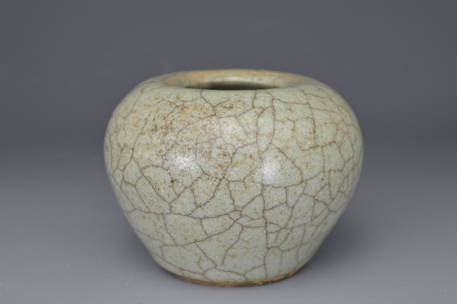 A CHINESE CELADON CRACKLE GLAZED JARLET / WATER DROPPER (1 of 8)