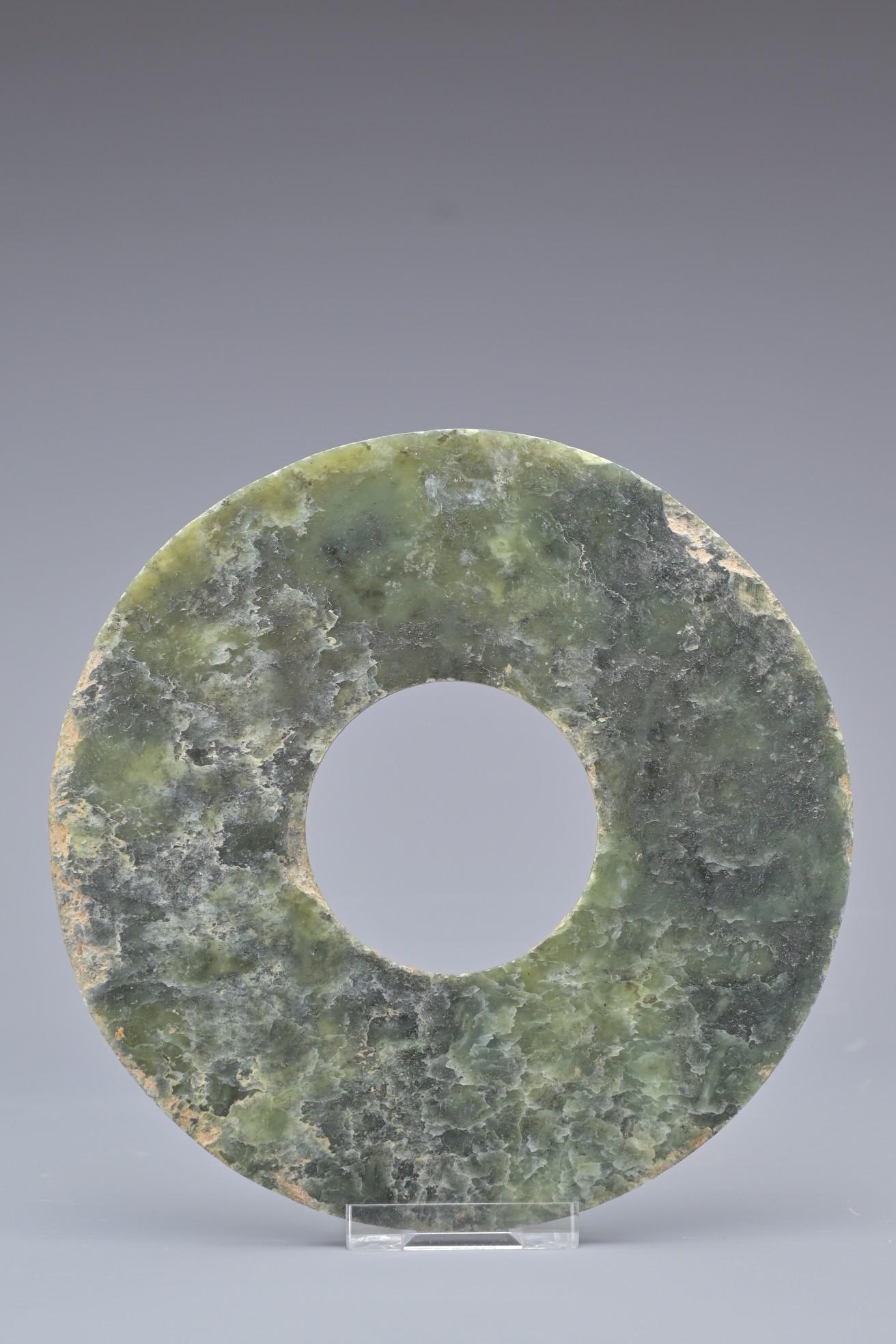AN EARLY CHINESE JADE BI DISC, HAN DYNASTY OR LATER (1 of 7)
