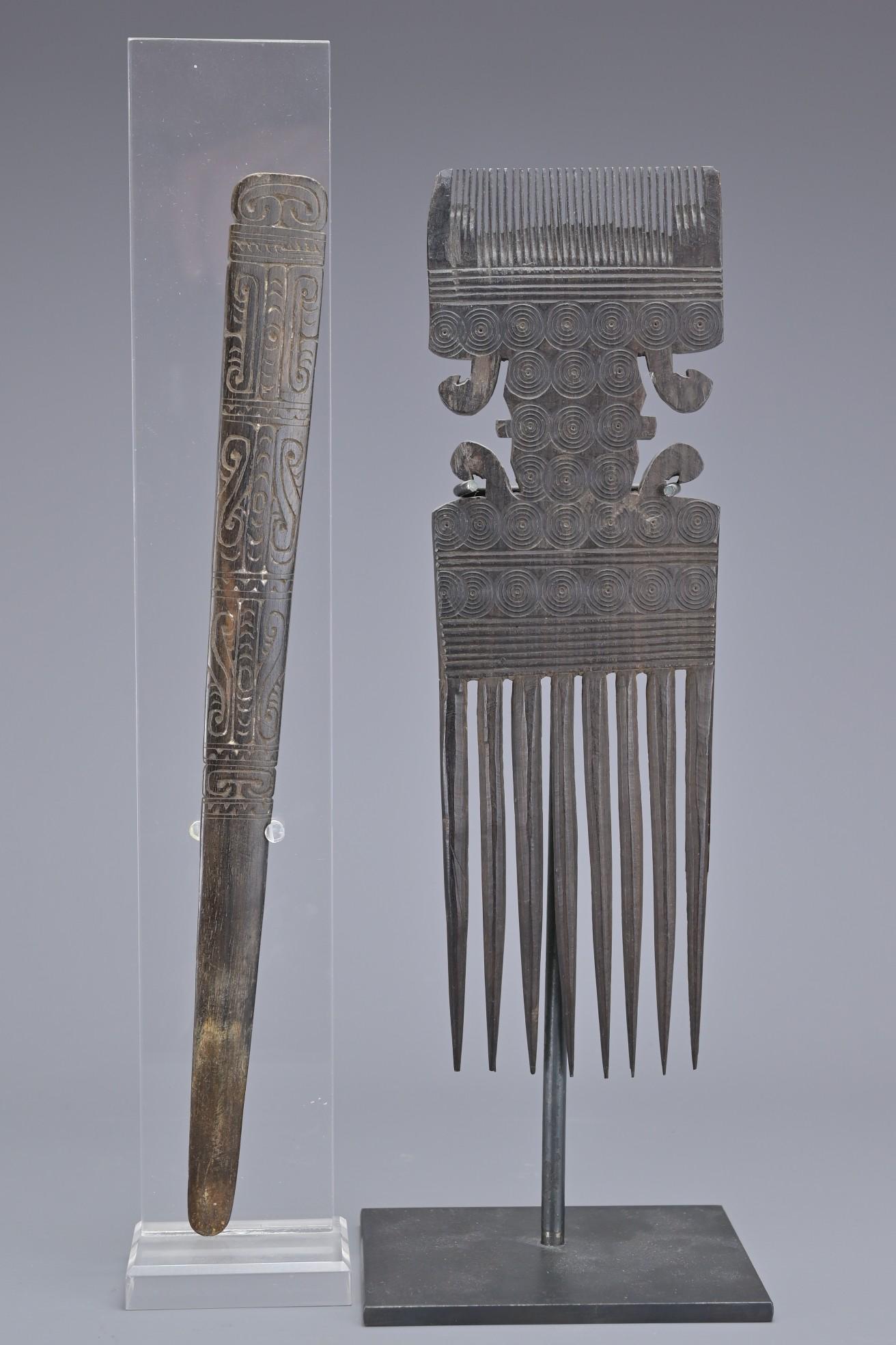 AN AFRICAN SWAHILI CARVED WOODEN TRIBAL COMB AND PAPUA LIME SPATULA (1 of 11)