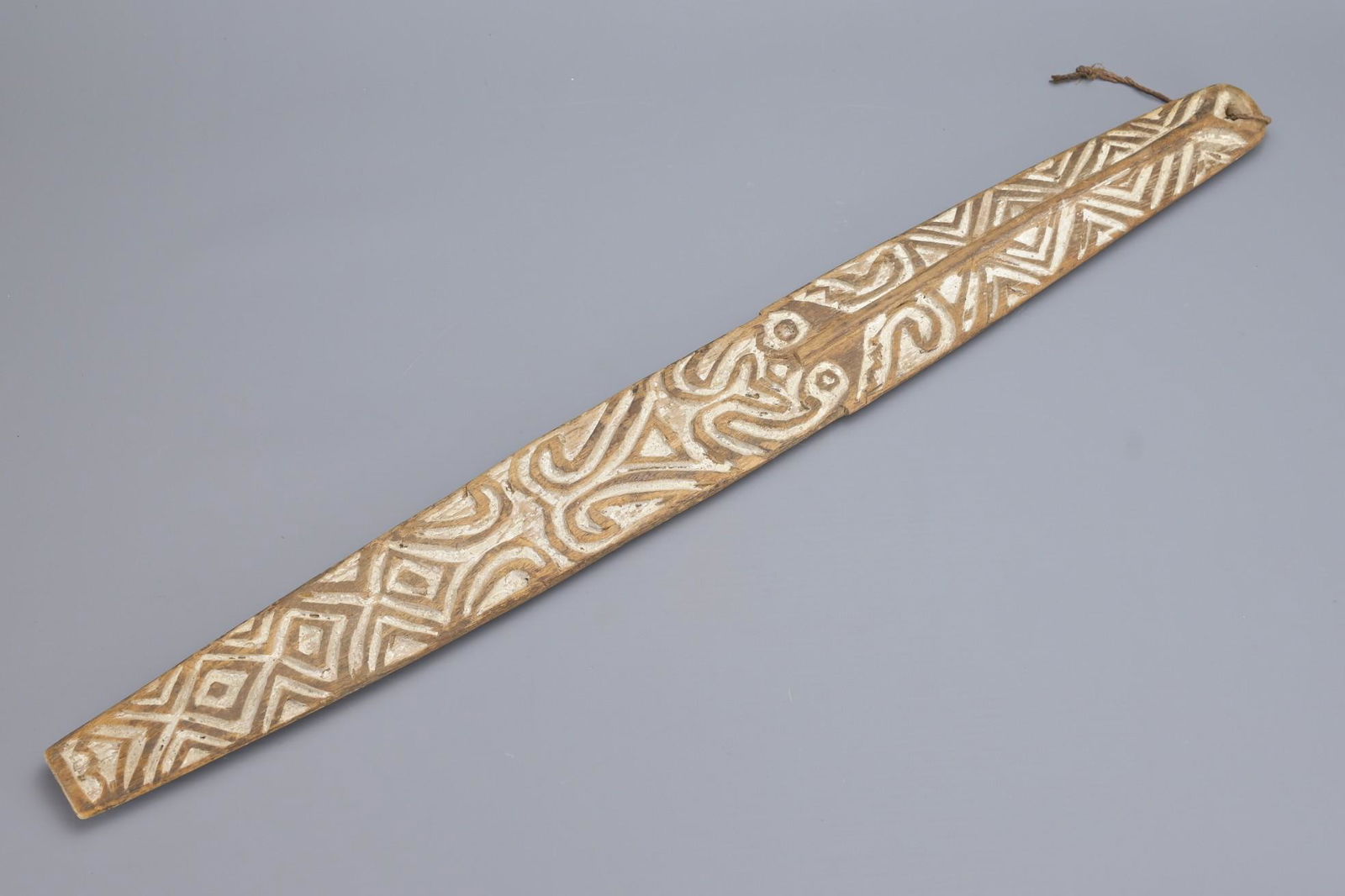 A PAPUA NEW GUINEA GOPE BOARD (BULL-ROARER) (1 of 8)