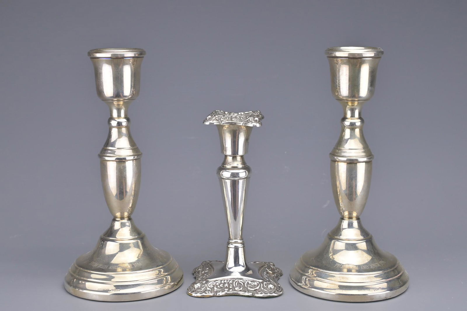 THREE SILVER HALLMARKED CANDLESTICKS (1 of 7)