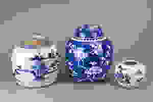 THREE CHINESE BLUE AND WHITE PORCELAIN ITEMS. To include a ginger jar and cover with prunus First Image