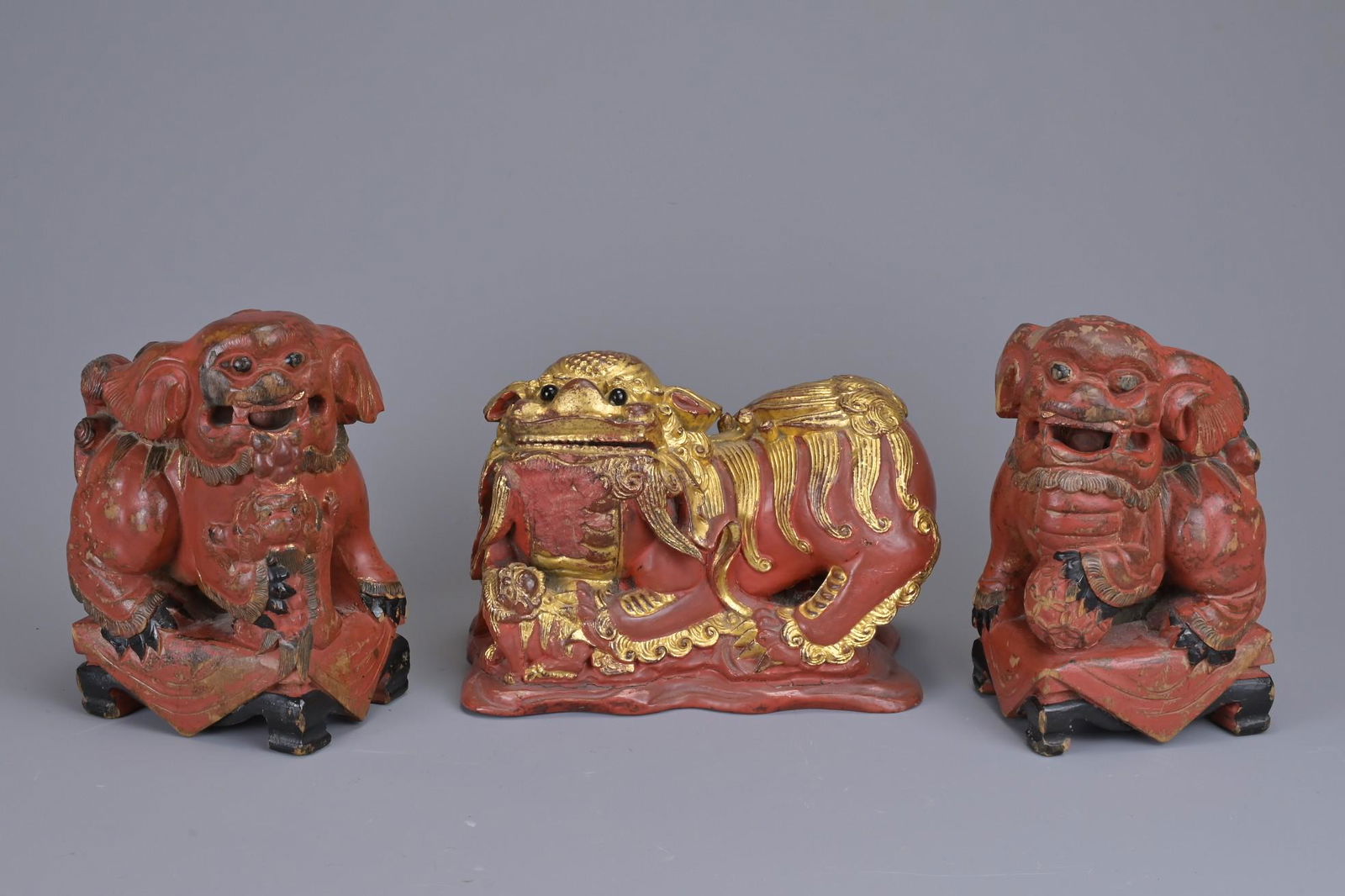 THREE CHINESE CARVED WOOD TEMPLE LION DOGS, 19/20TH CENTURY (1 of 5)