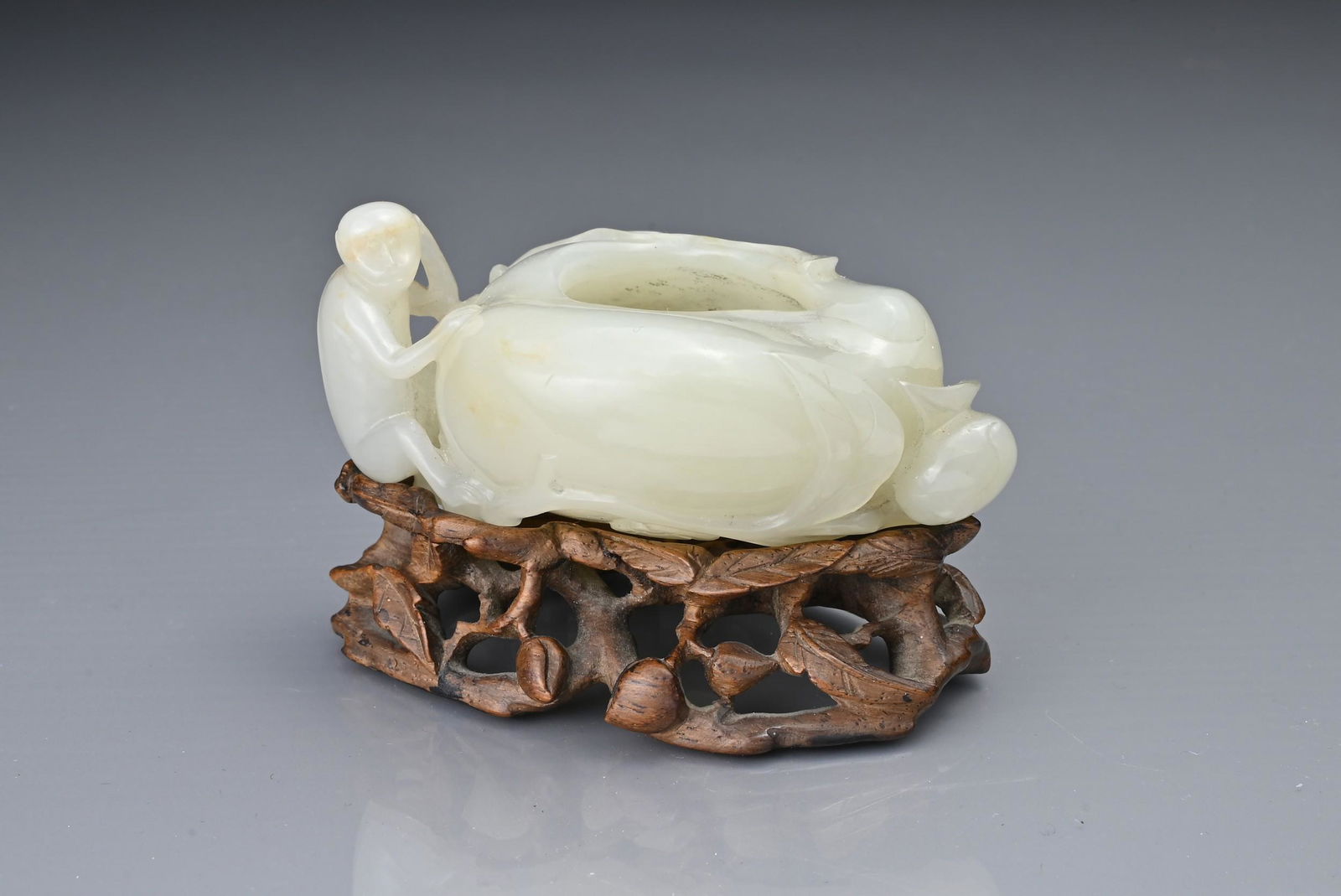 A CHINESE WHITE JADE BRUSH WASHER / WATER POT, QING DYNASTY. In the form of a hollowed peach on a (1 of 6)