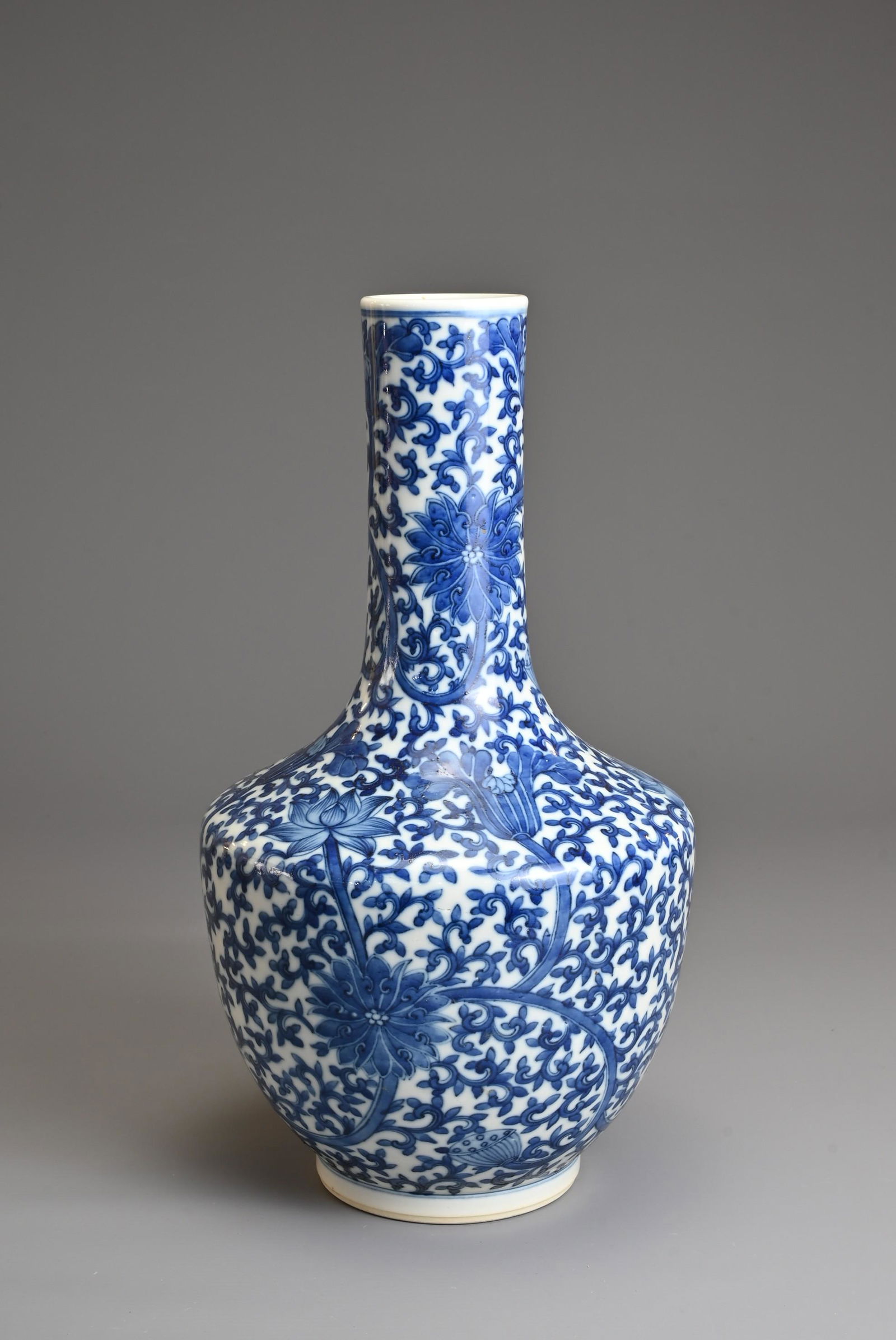 A CHINESE BLUE AND WHITE PORCELAIN VASE, 19TH CENTURY. Decorated with chrysanthemum and lotus (1 of 7)