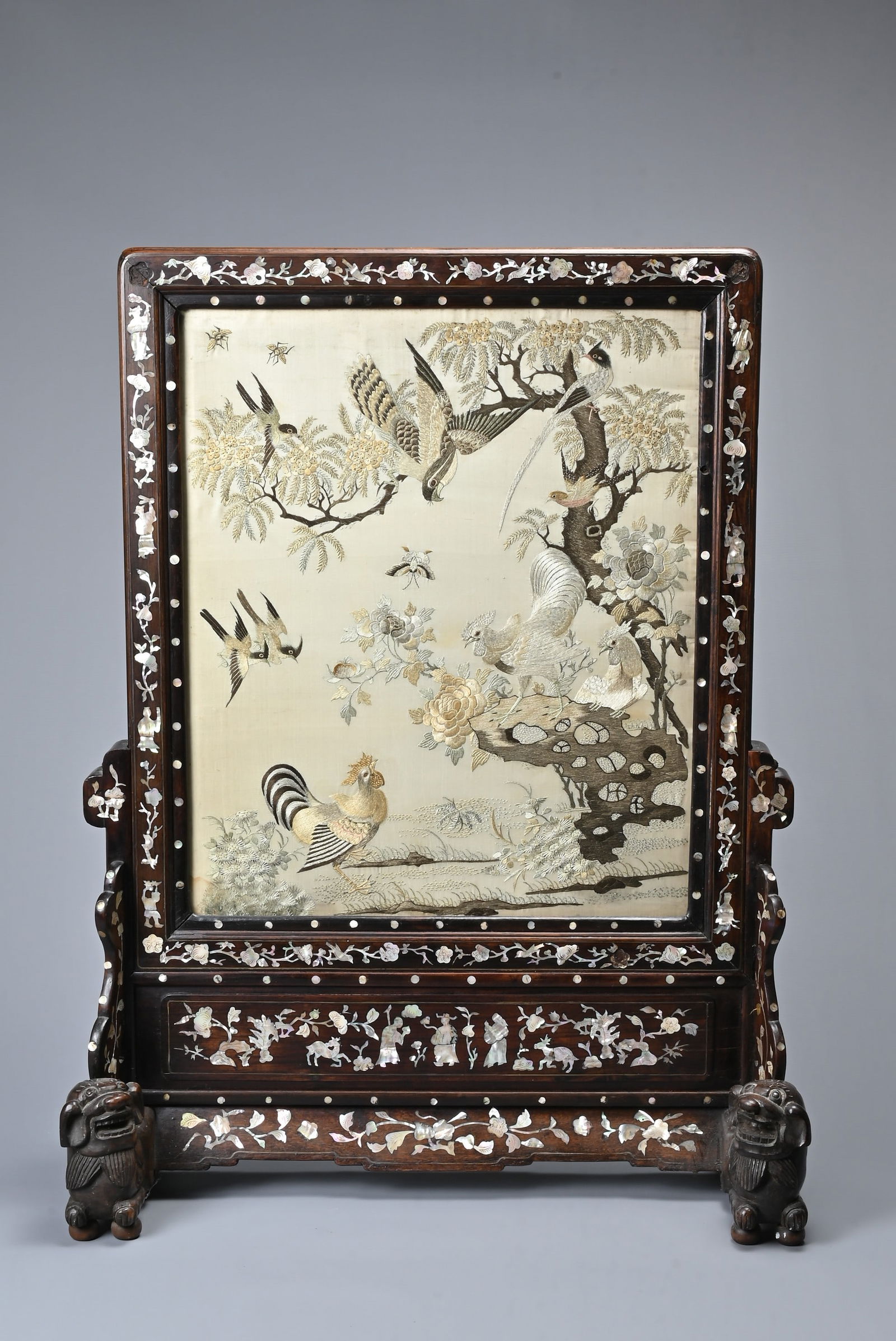 A CHINESE MOTHER OF PEARL INLAID SILK EMBROIDERED SCREEN, 19TH CENTURY. Depicting one hundred (1 of 12)