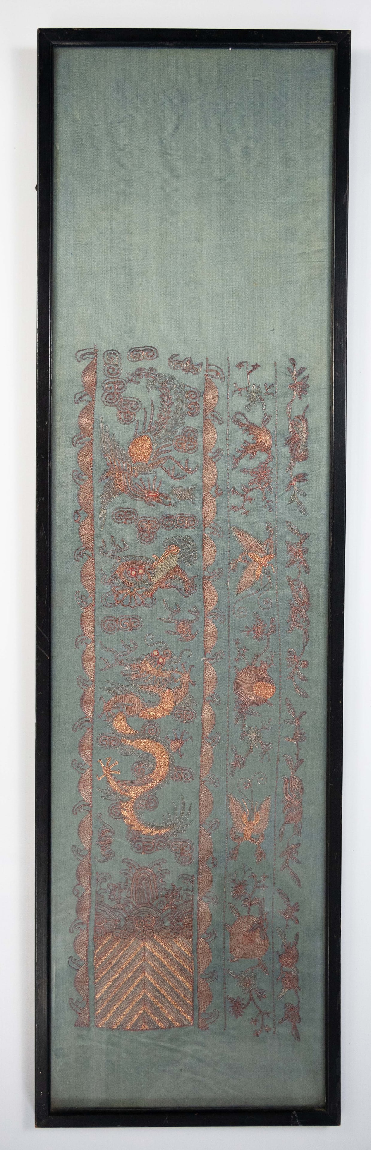 A FRAMED CHINESE SILK EMBROIDERED PANEL 19/20TH CENTURY. A Mandarin sleeve turquoise ground (1 of 6)