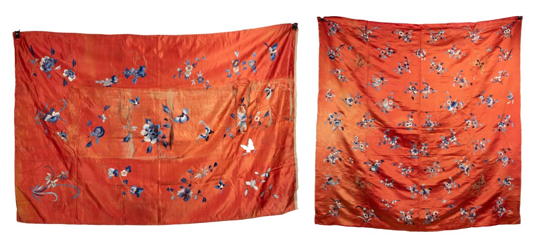 TWO LARGE CHINESE CORAL-GROUND EMBROIDERED SILK COVERINGS, QING DYNASTY: TWO LARGE CHINESE CORAL-GROUND EMBROIDERED SILK COVERINGS, QING DYNASTY. Embroidered in blue, cream and gilt thread with butterflies, insects and loose flower sprays, approx. 150cm x 150cm and 151cm x
