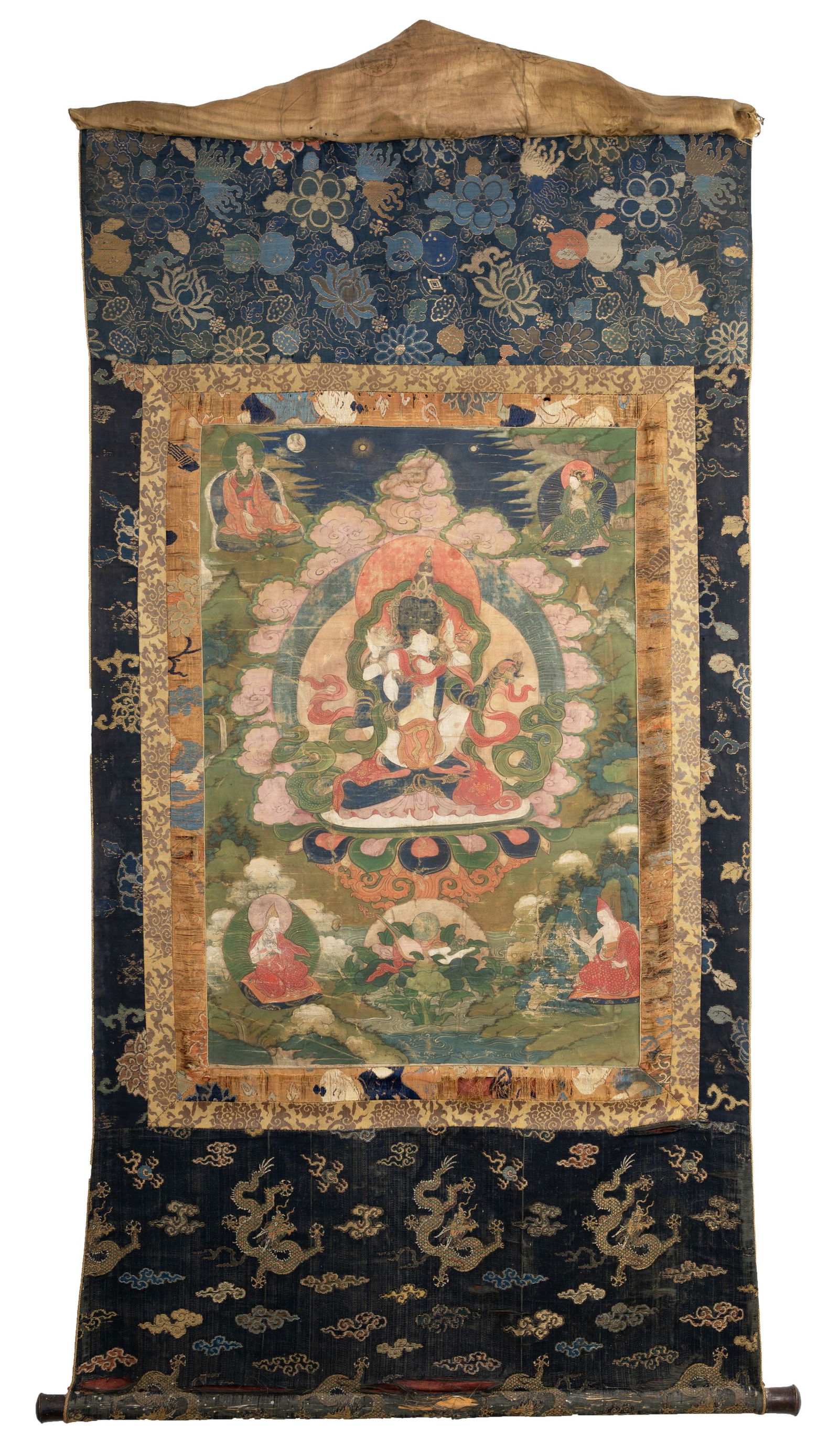 A SINO TIBETAN THANGKA OF VAJRASATTVA, 17/18TH CENTURY. In yab-yum with his consort surrounded by (1 of 12)