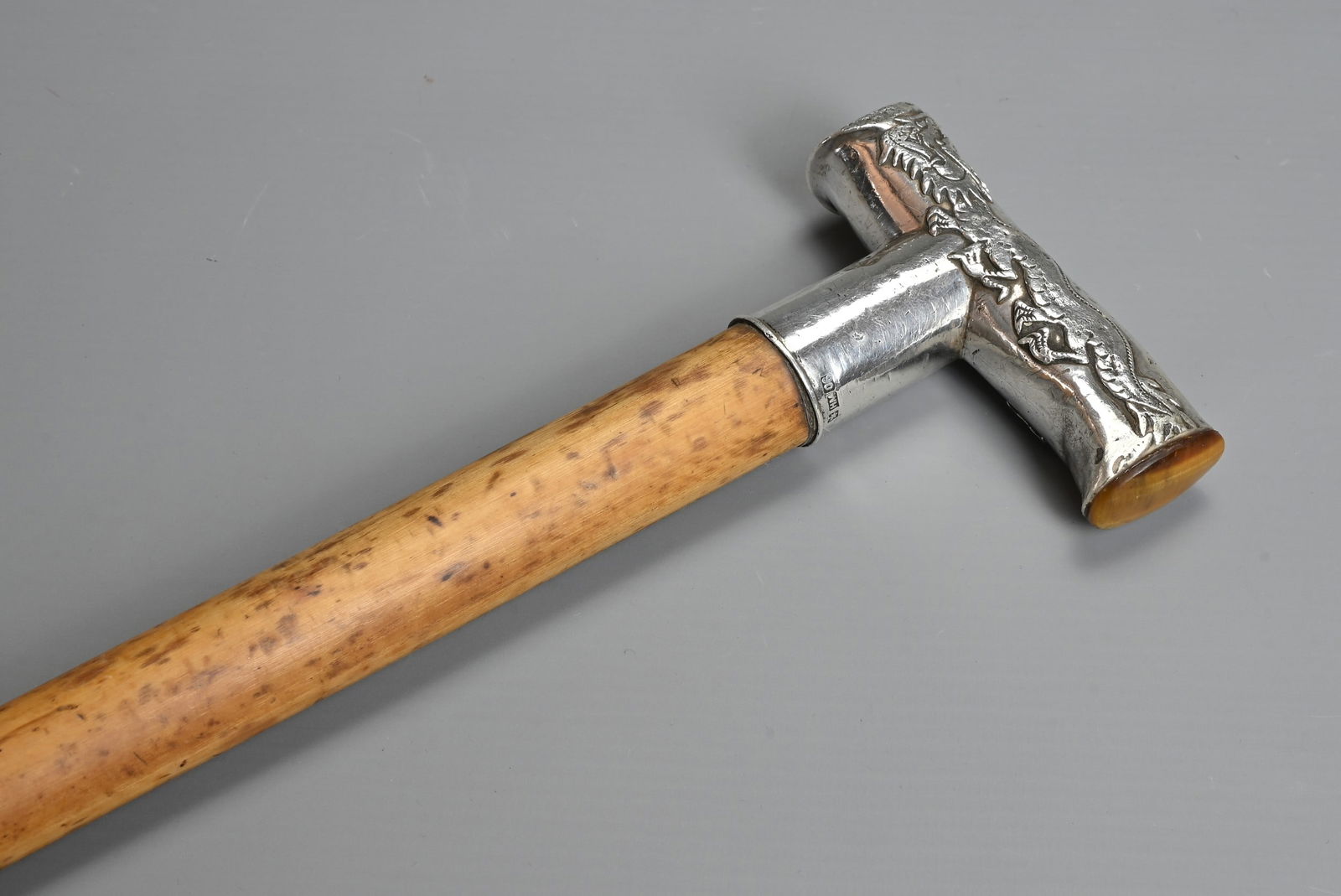 A CHINESE EXPORT SILVER HANDLED CANE, WANG HING, EARLY 20TH CENTURY. The handle with two dragons in (1 of 6)
