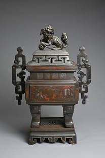 A LARGE AND IMPRESSIVE VIETNAMESE SILVER AND COPPER INLAID BRONZE CENSER ON STAND, 19/20TH CENTURY.: A LARGE AND IMPRESSIVE VIETNAMESE SILVER AND COPPER INLAID BRONZE CENSER ON STAND, 19/20TH CENTURY. The censer heavily cast of rectangular form set on four scroll legs with separately cast, elaborate