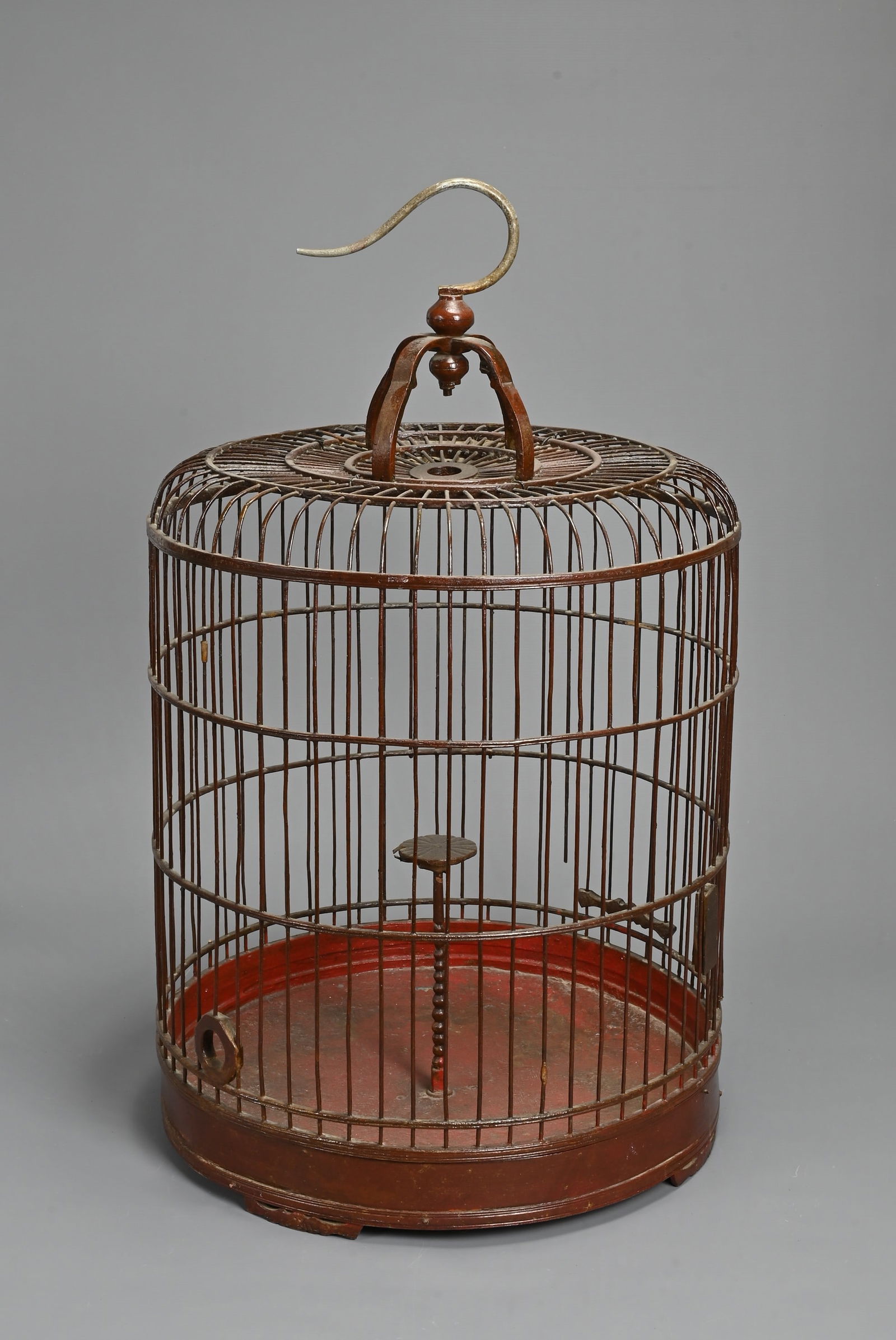 A LARGE 20TH CENTURY CHINESE RED PAINTED/LACQUERED WOOD BIRDCAGE. Of domed form, with central bobbin (1 of 7)