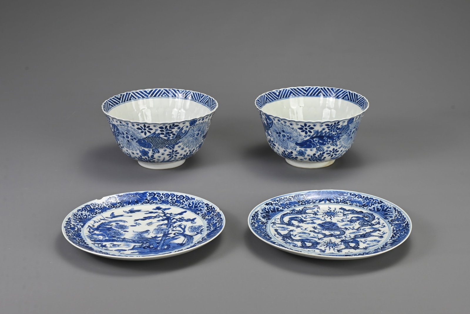 A GROUP OF CHINESE BLUE AND WHITE PORCELAIN ITEMS, 19TH CENTURY. To include a pair of lobed fish (1 of 6)