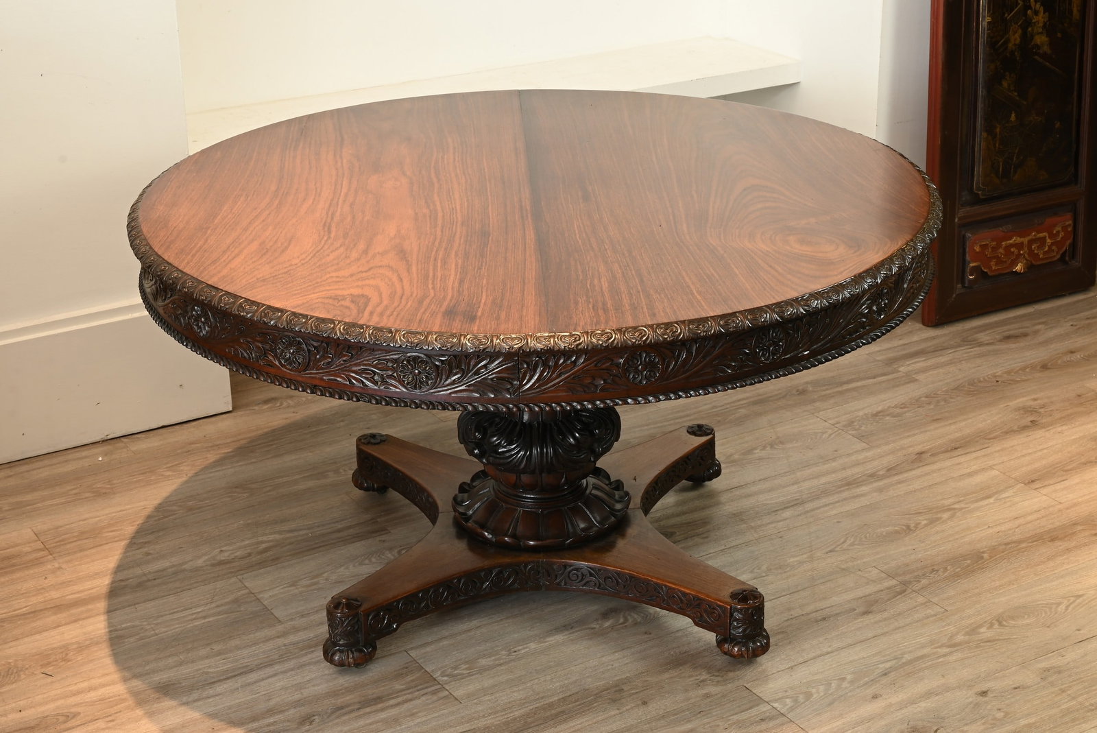 A LARGE ANGLO INDIAN ROSEWOOD CENTRE TABLE, 19TH CENTURY. Round circular top with carved floral (1 of 6)