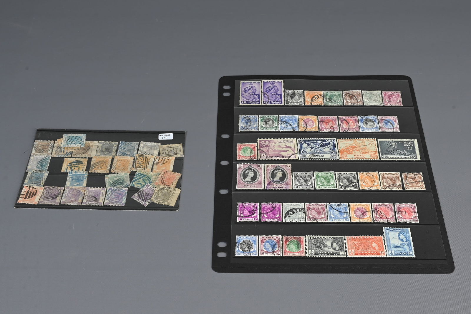 A QUANTITY OF HONG KONG AND MALAYSIA STAMPS. Thirty three Malaya Penang stamps together with twenty (1 of 2)