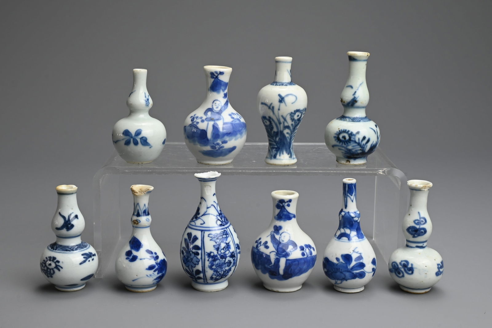 A GROUP OF CHINESE BLUE AND WHITE PORCELAIN DOLL'S HOUSE MINIATURE VASES, EARLY 18TH CENTURY. Ten (1 of 5)