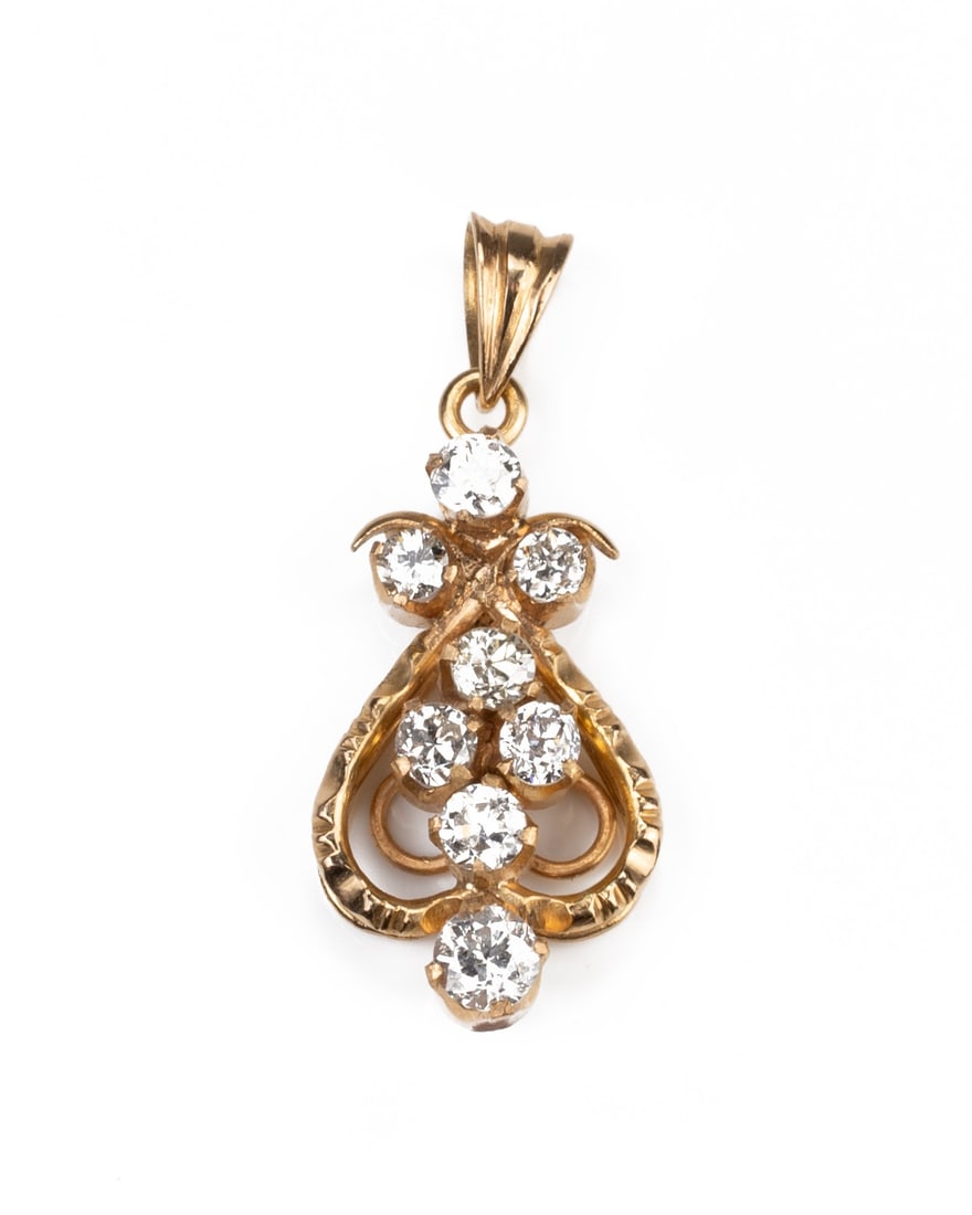 A HIGH CARAT YELLOW GOLD DIAMOND PENDANT, MID 20TH CENTURY (1 of 4)