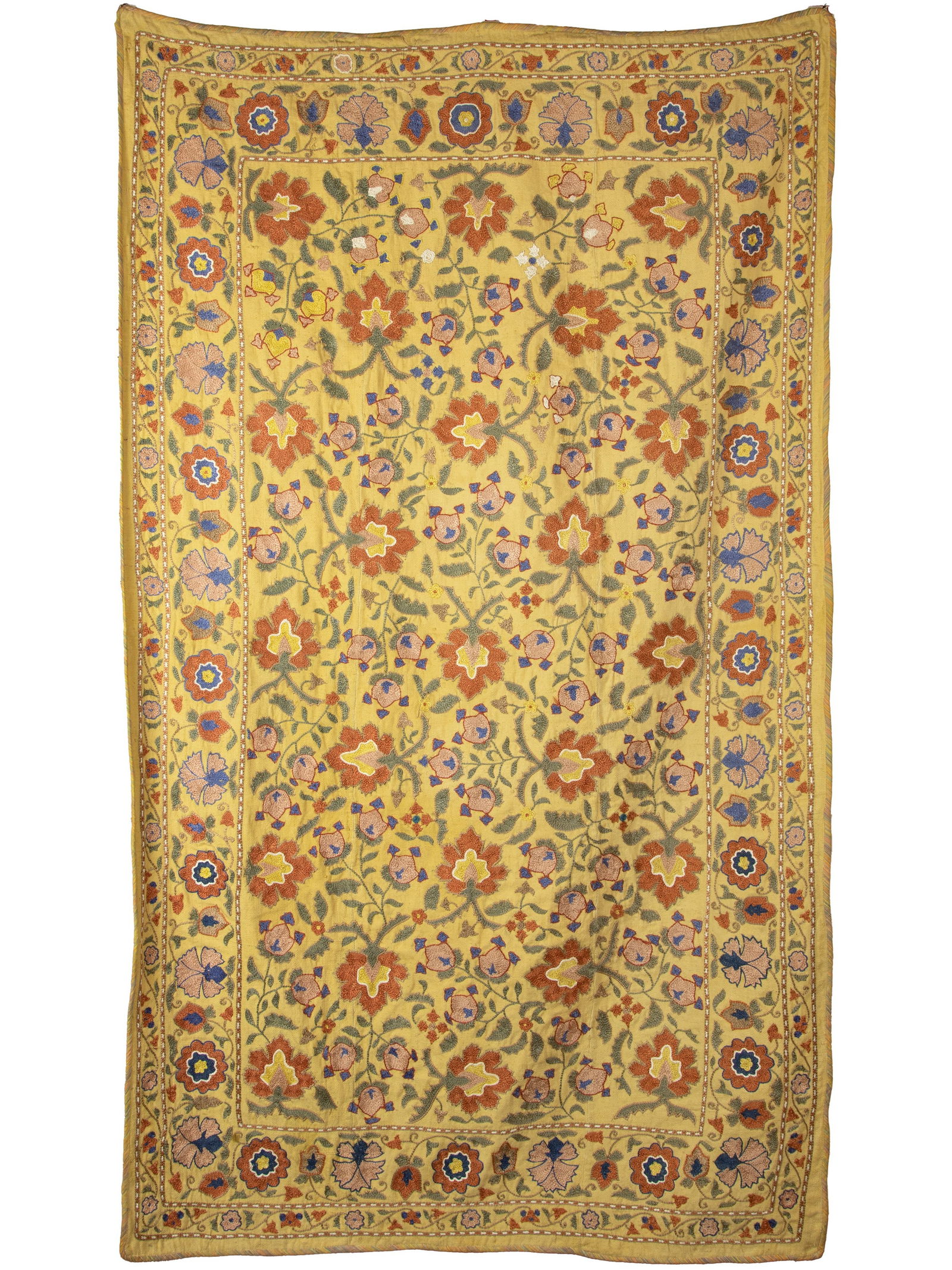 A 20TH CENTURY SUZANI WALL HANGING. Stitched with scrolling pink, red and blue flowers amongst green (1 of 2)