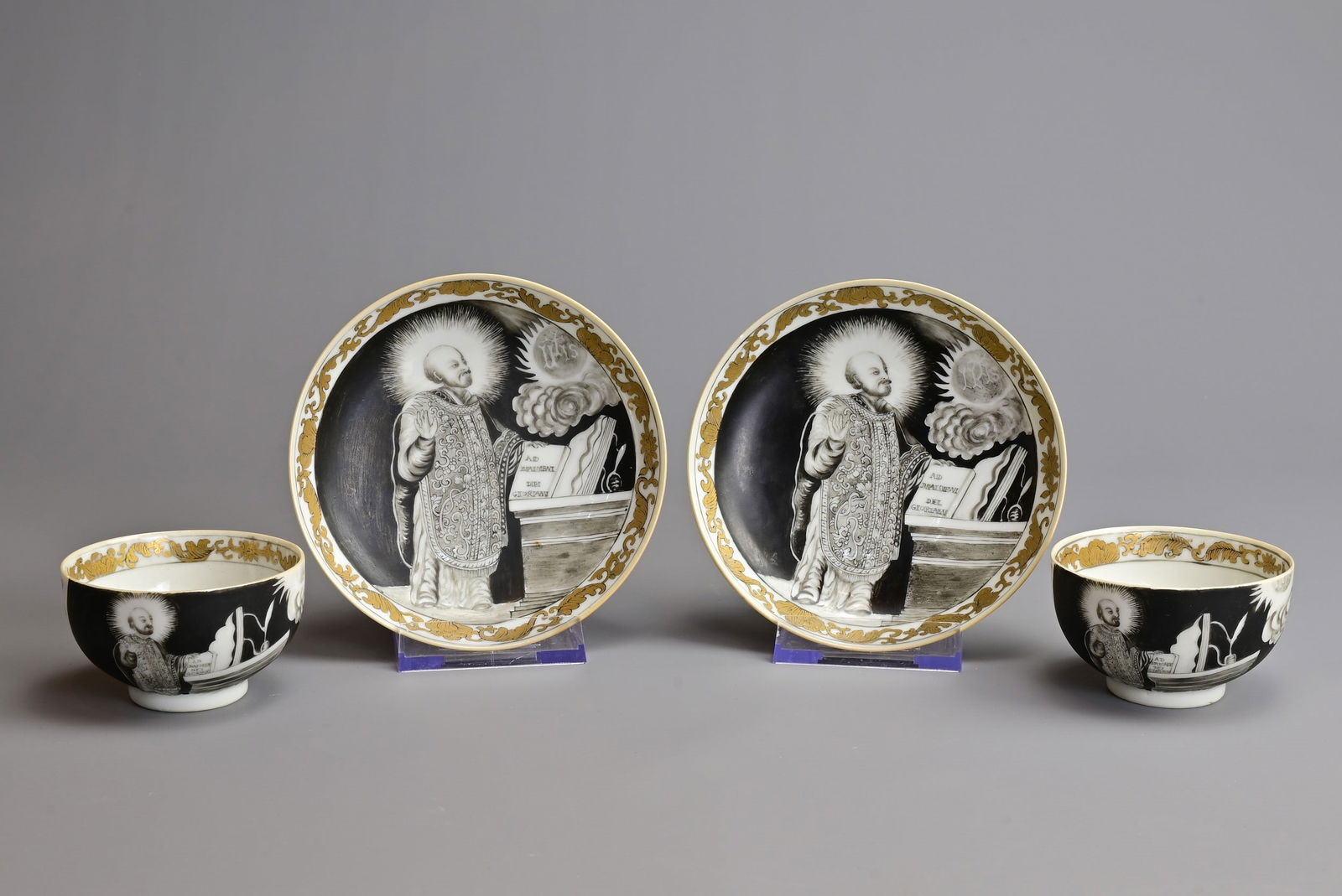 A RARE PAIR OF CHINESE GRISAILLE AND GILT ST. IGNATIUS PORCELAIN CUPS AND SAUCERS, 18TH CENTURY. (1 of 8)