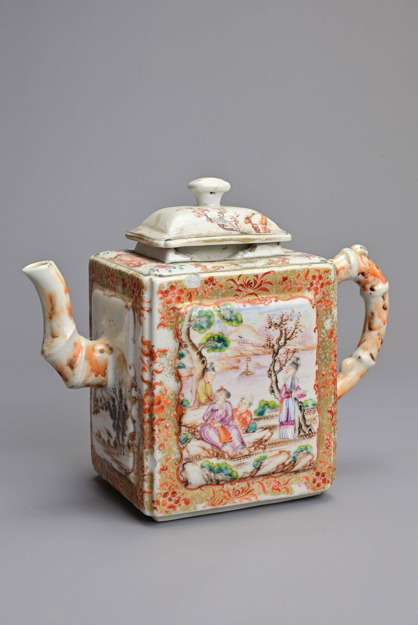 A CHINESE FAMILLE ROSE PORCELAIN TEAPOT, 18TH CENTURY. Of rectangular form decorated in mandarin (1 of 11)