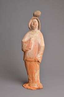 A CHINESE TANG DYNASTY (AD 618-907) PAINTED POTTERY FIGURE OF COURT LADY. Modelled standing: A CHINESE TANG DYNASTY (AD 618-907) PAINTED POTTERY FIGURE OF COURT LADY. Modelled standing wearing a long flowing robe, with ball-shaped black coiffured hair, with one arm raised to her chest and the