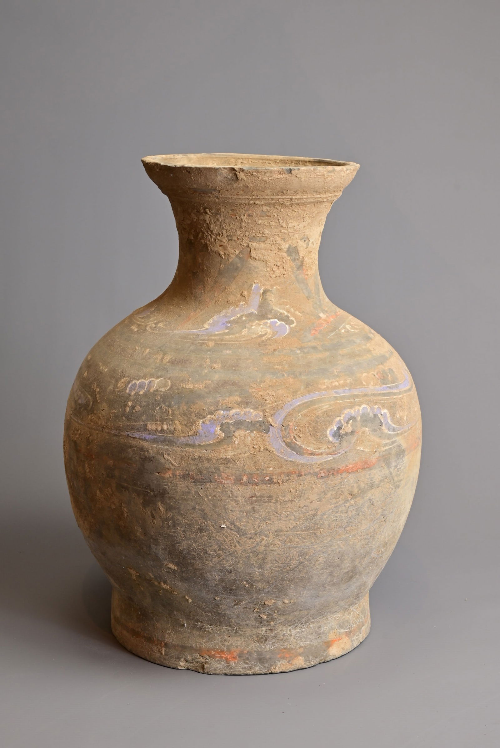A LARGE CHINESE HAN DYNASTY OVIFORM POTTERY VASE, 206 BC TO 220 AD. With flared neck, painted with (1 of 6)
