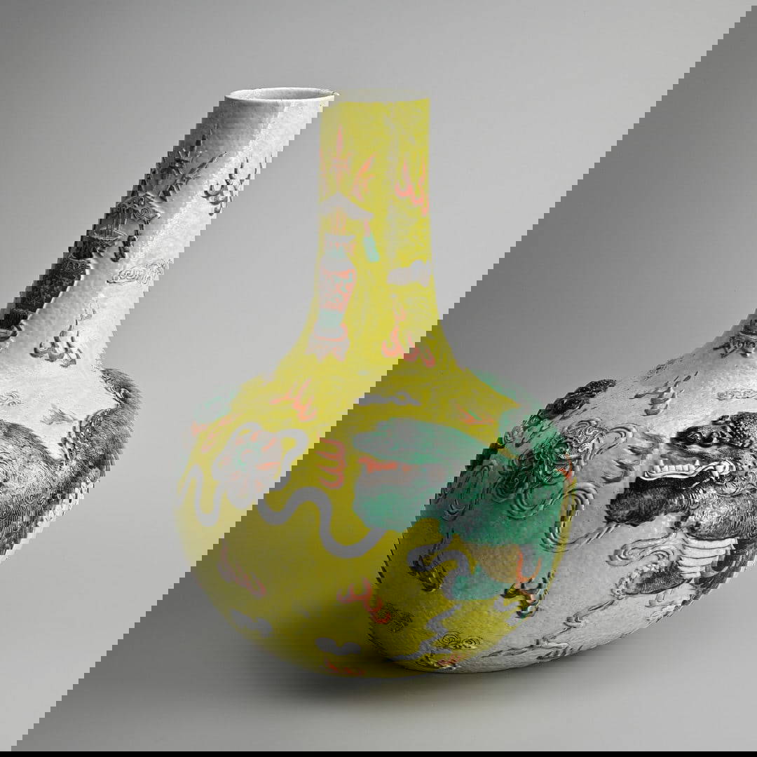 A LARGE CHINESE MOULDED YELLOW-GROUND PORCELAIN VASE, TIANQIUPING, QING DYNASTY.