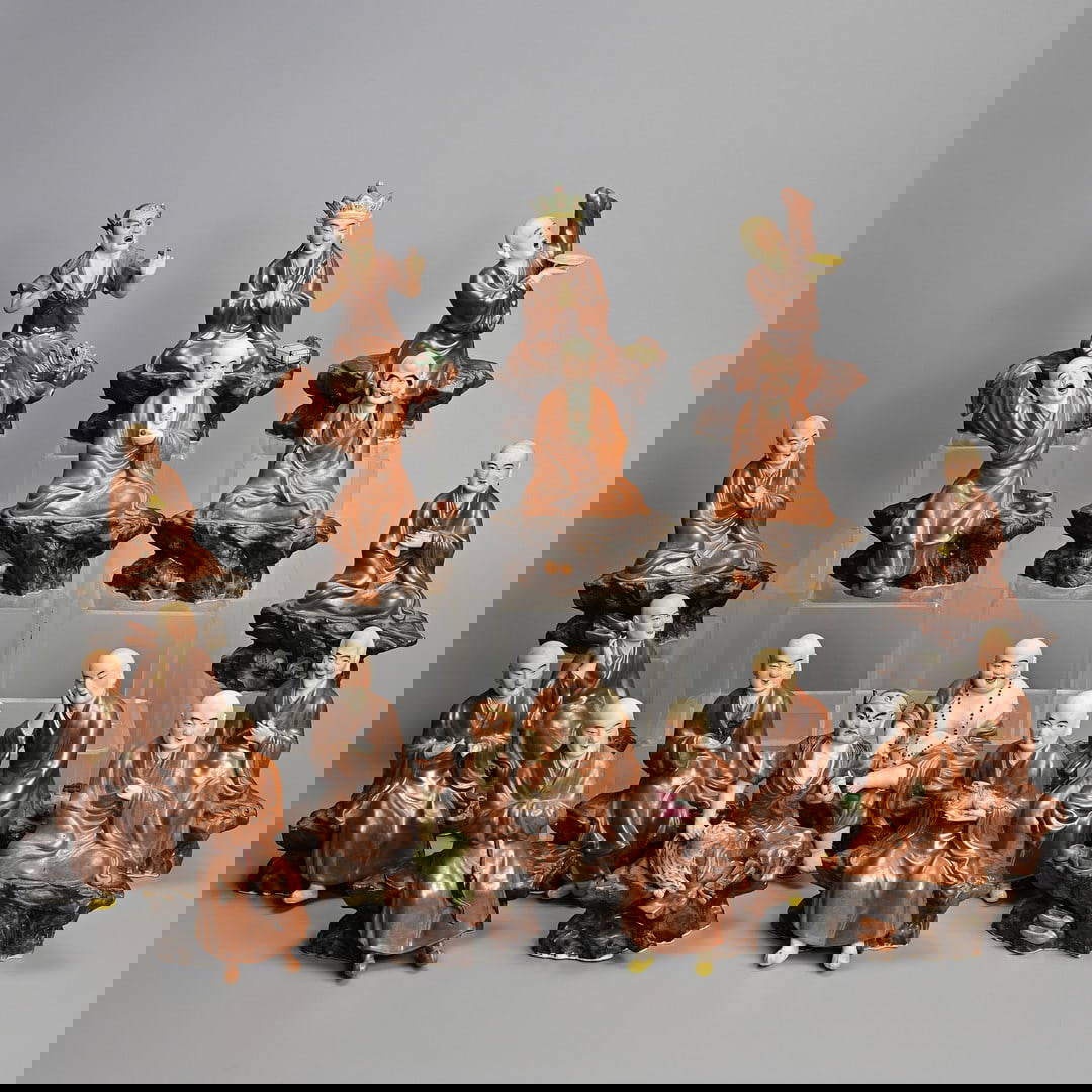 A SET OF CHINESE PAINTED AND ENAMELLED BISCUIT PORCELAIN LUOHAN FIGURES, ATTRIBUTED TO ZENG