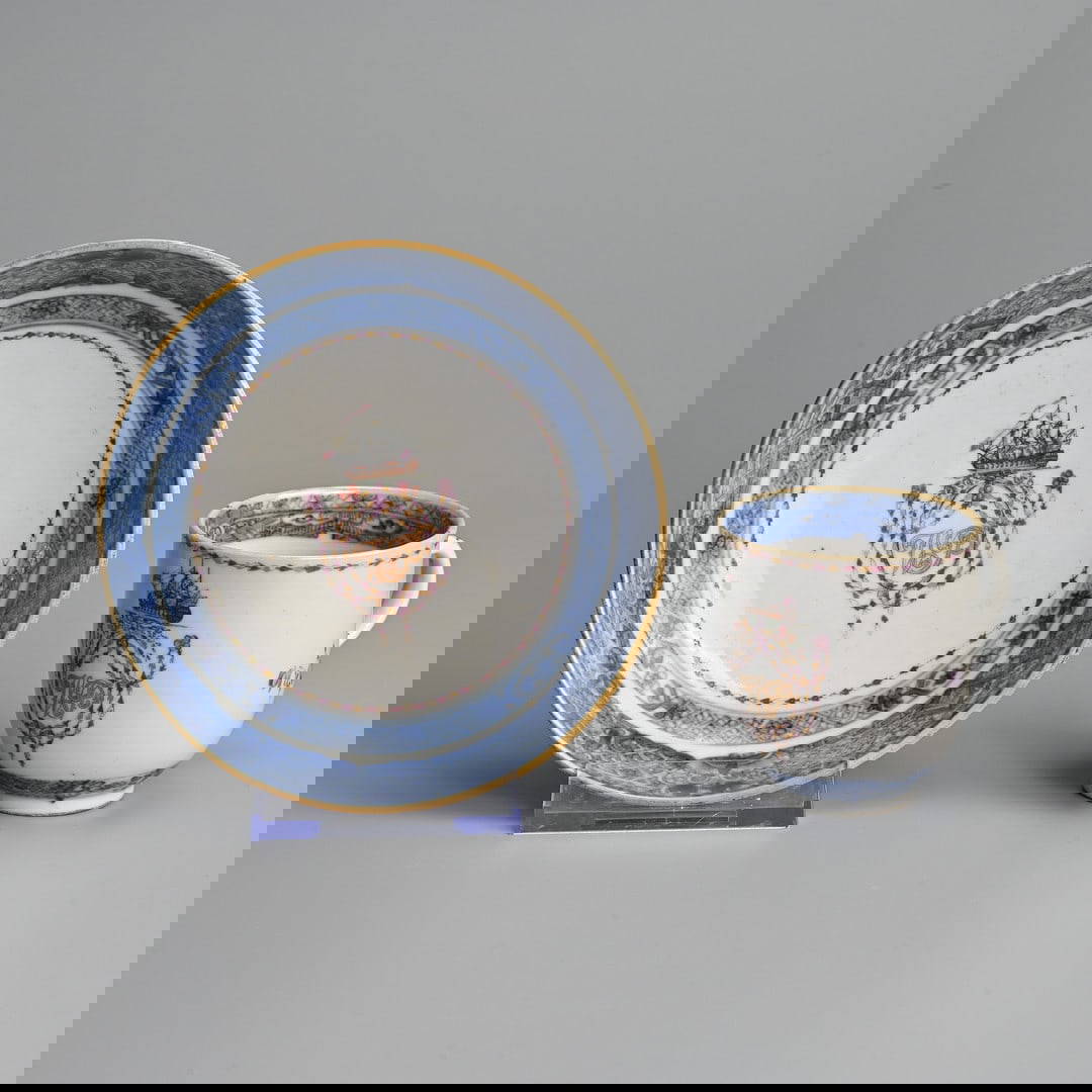 A CHINESE EXPORT FAMILLE ROSE PORCELAIN CRESTED COFFEE-CUP AND SAUCER, QIANLONG (1736-1795).