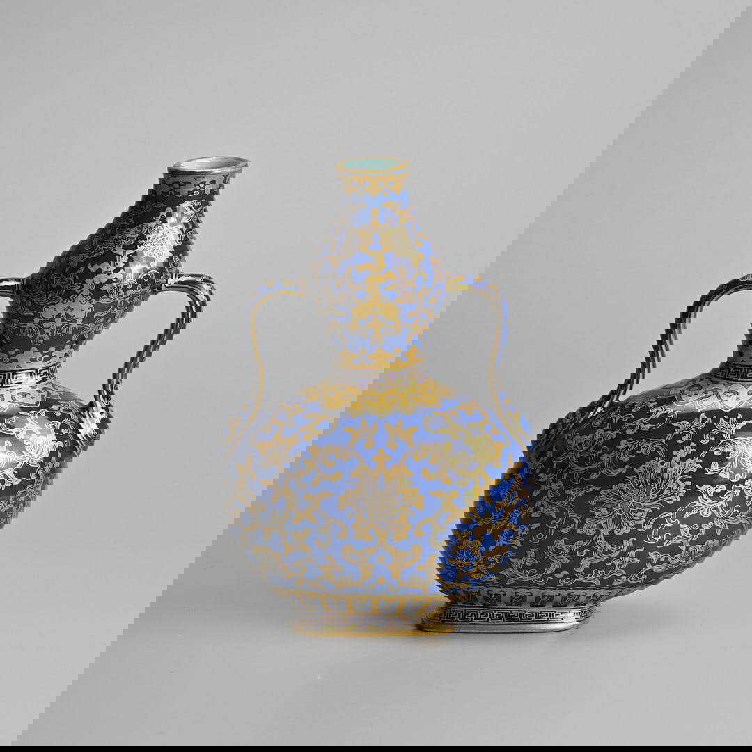 A CHINESE BLUE-GROUND AND GILT DECORATED TWIN-HANDLED DOUBLE GOURD PORCELAIN VASE, DAOGUANG MARK.