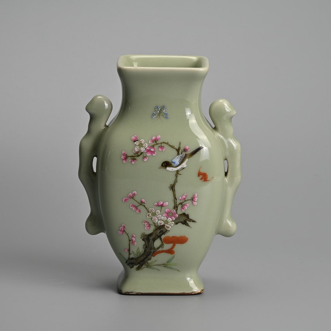 A CHINESE CELADON-GROUND FAMILLE ROSE PORCELAIN VASE.