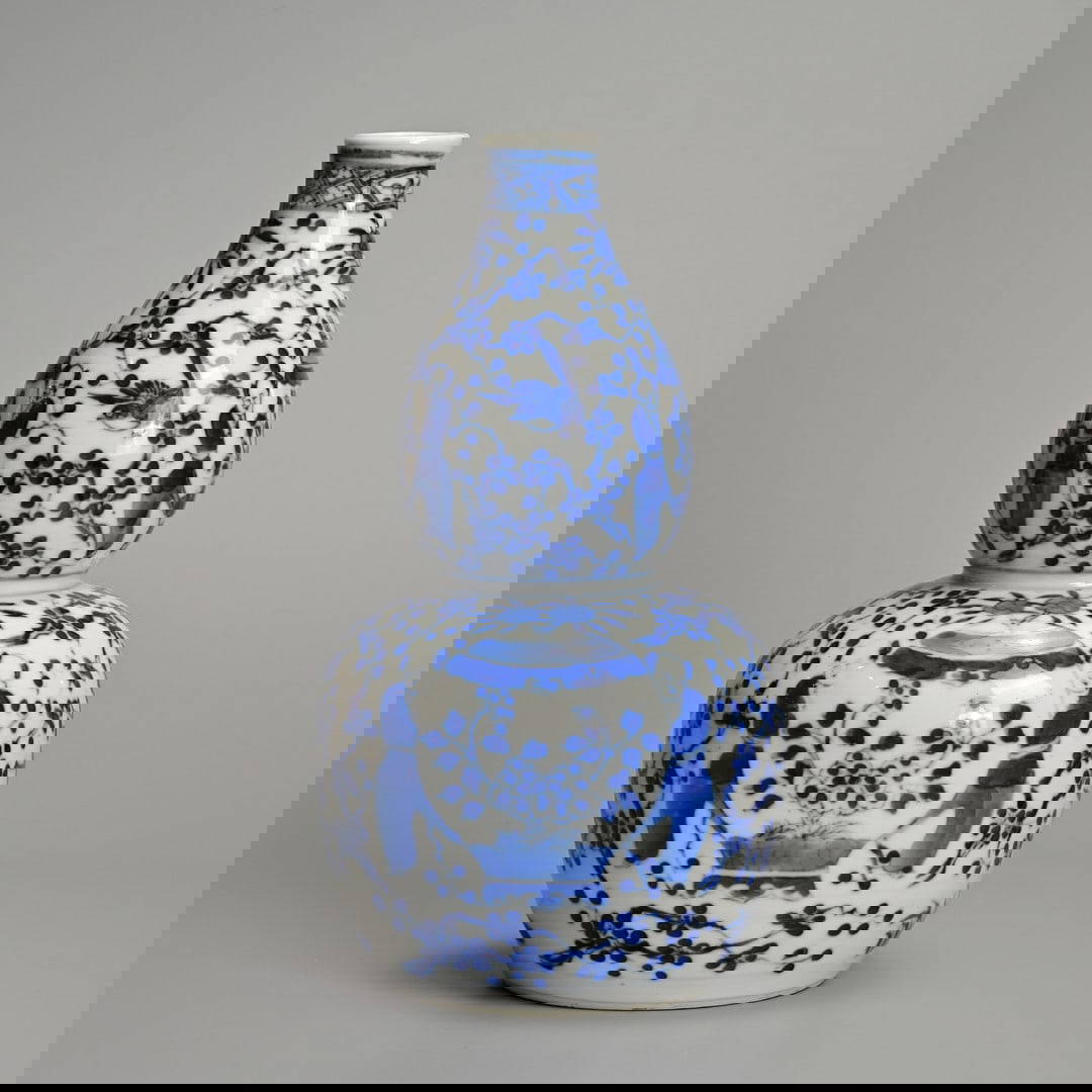 A CHINESE BLUE AND WHITE PORCELAIN DOUBLE GOURD VASE, 19/20TH CENTURY.