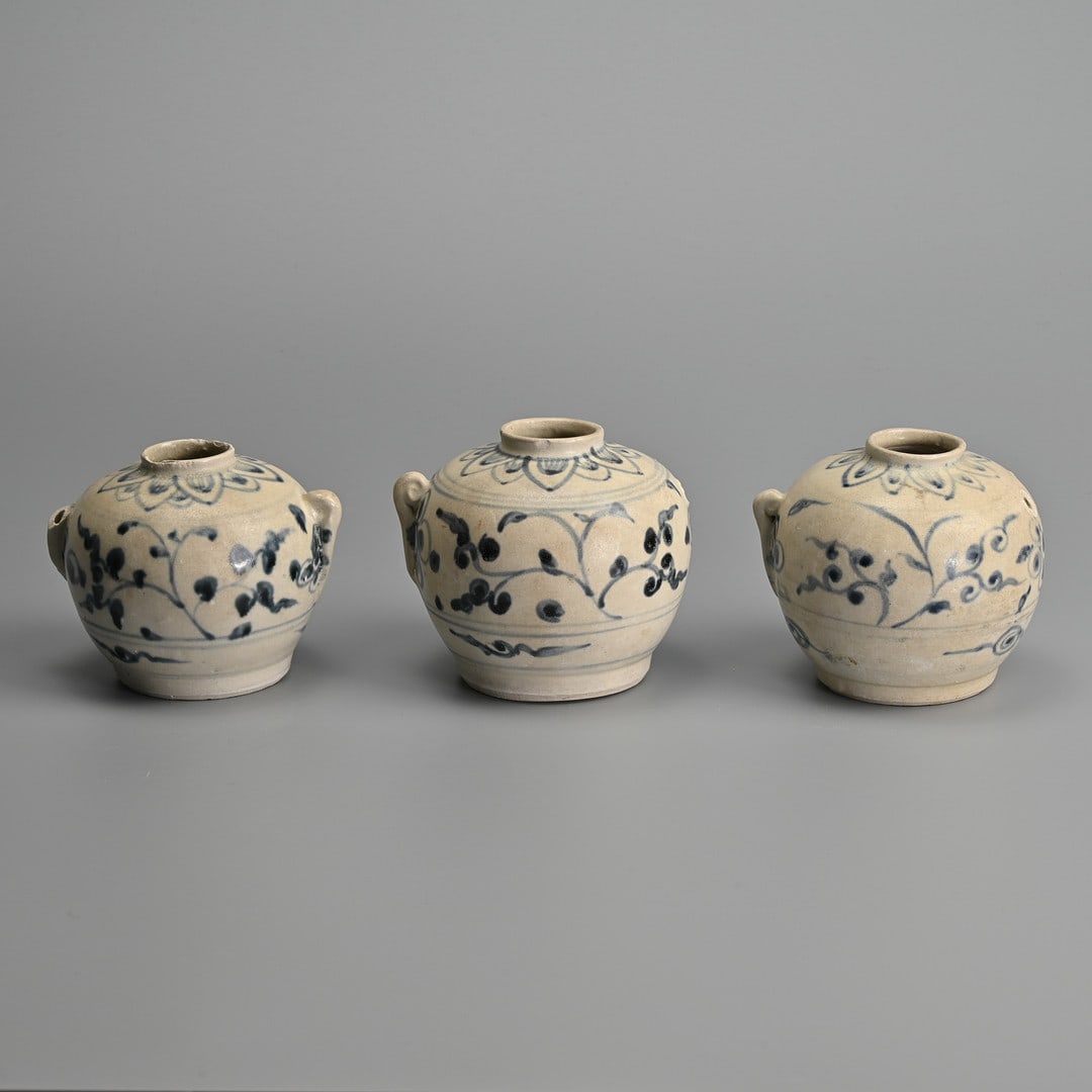 THREE HOI AN HOARD BLUE AND WHITE POTTERY JARS, VIETNAM, MID TO LATE 15TH CENTURY.