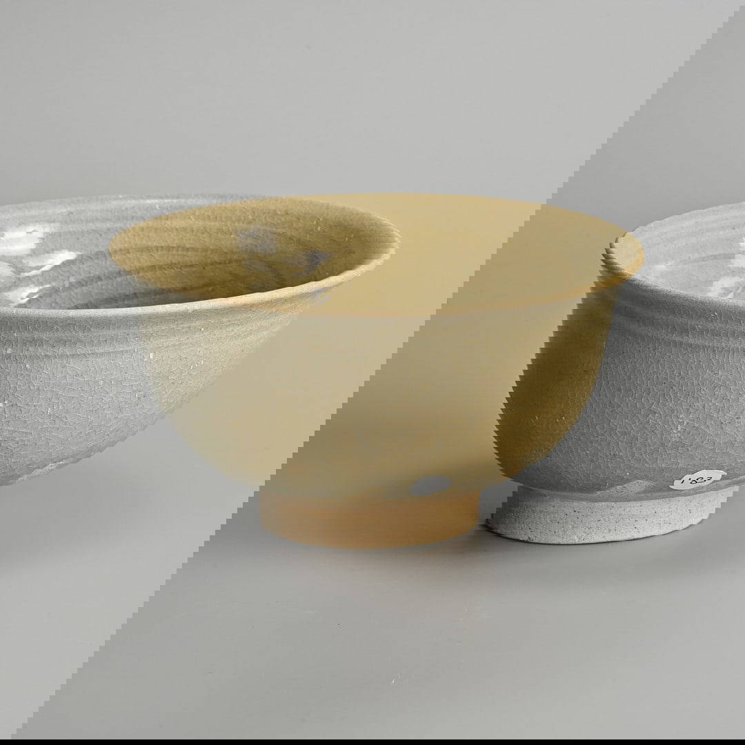 A THAI INCISED CELADON-GLAZED STONEWARE BOWL (EX. GRAHAME CLARKE COLLECTION), 13TH - 15TH CENTURY.