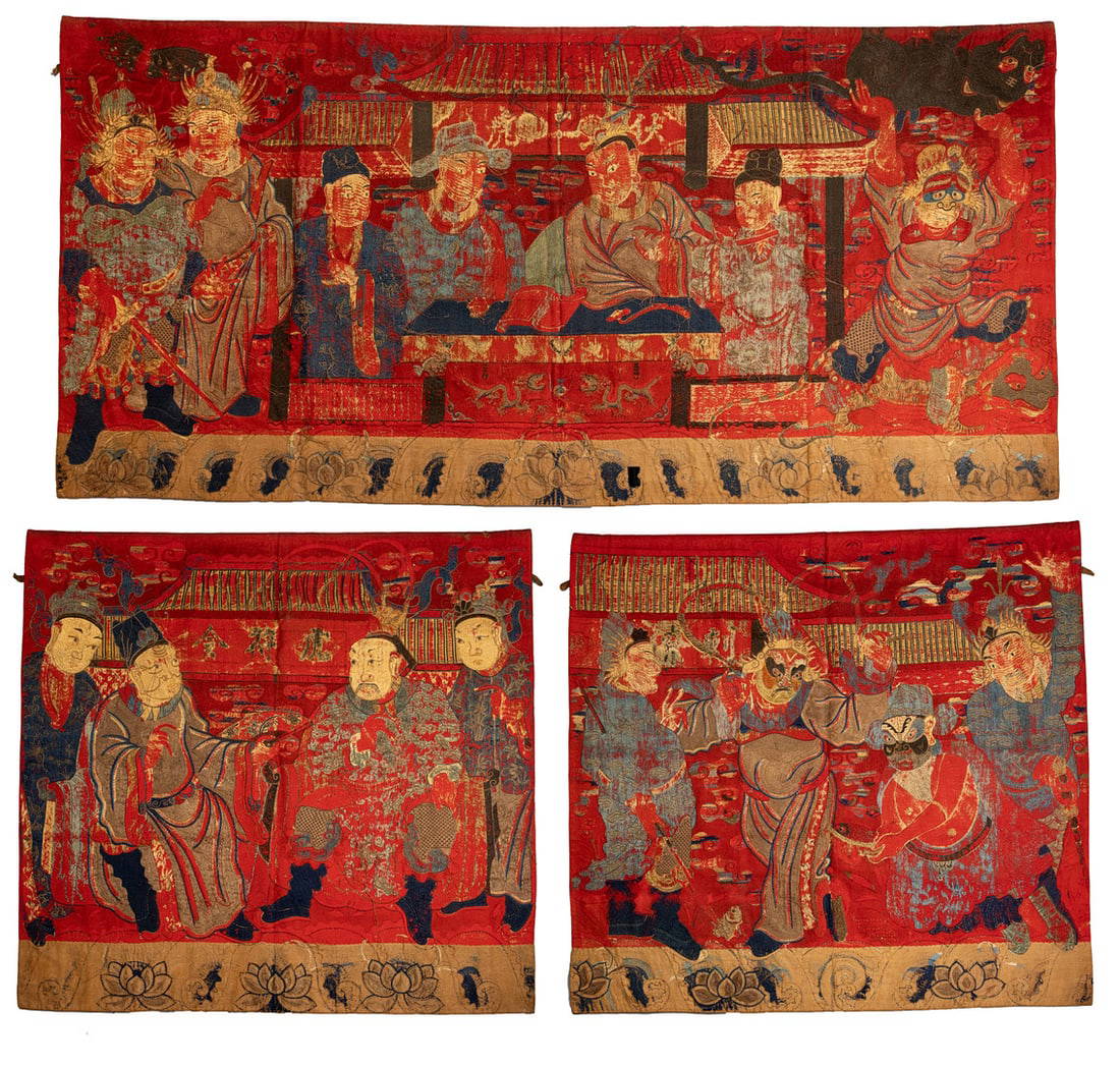 A SET OF THREE CHINESE EMBROIDERED WOOL RED-GROUND HANGINGS, QING DYNASTY.