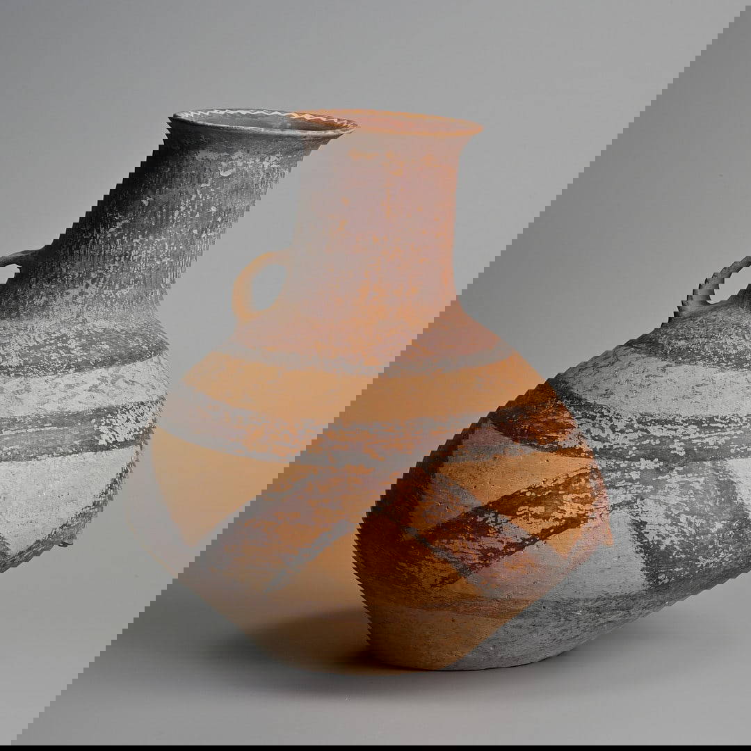 A RARE LARGE CHINESE NEOLITHIC MACHANG PHASE PAINTED POTTERY JAR, MAJIAYAO CULTURE (C.2300 - 2000