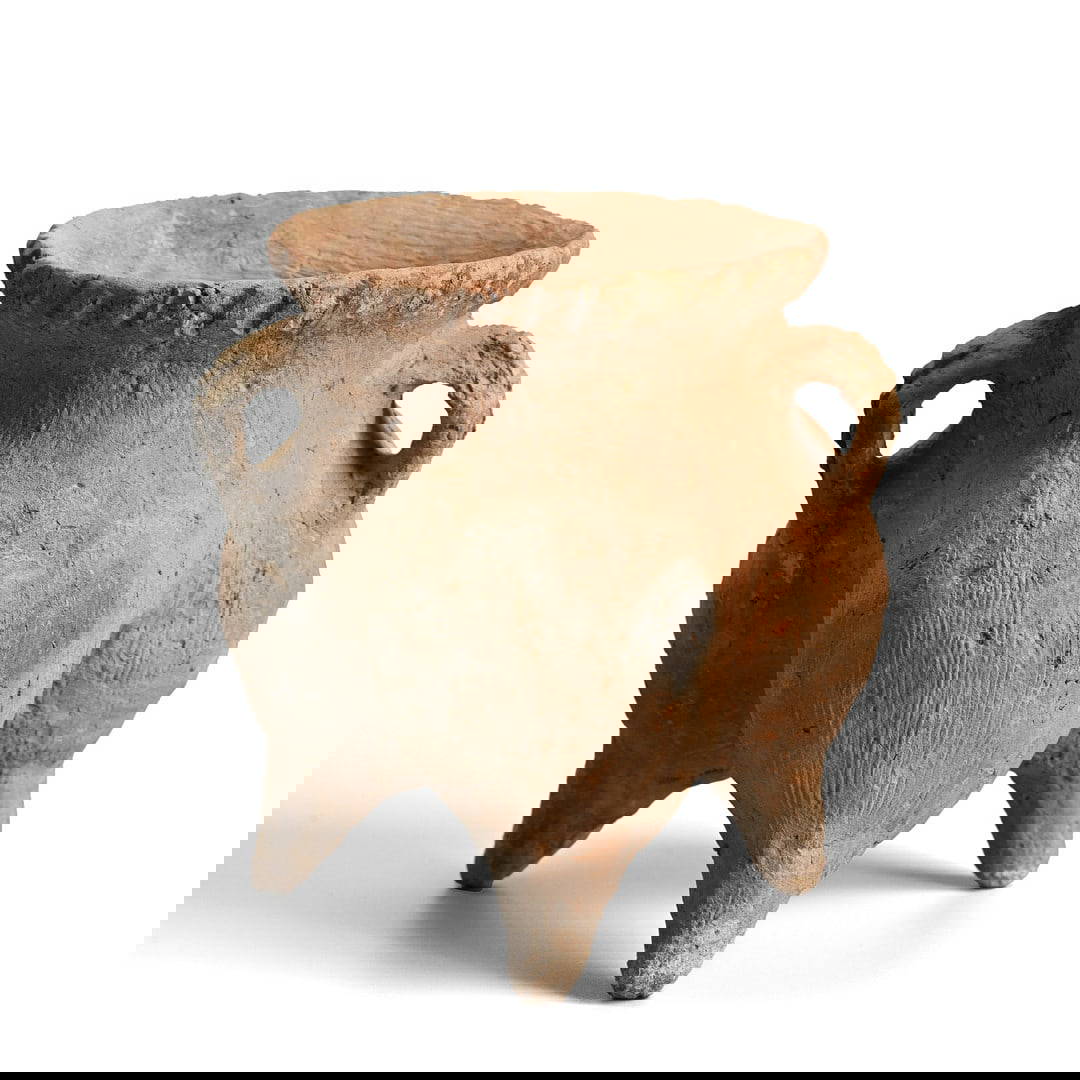 A RARE CHINESE POTTERY TRIPOD VESSEL, LI, NEOLITHIC QIJIA CULTURE, (C. 2050 - 1700 BC).