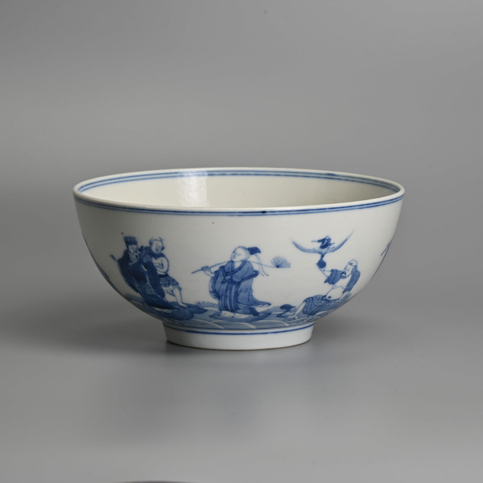 A CHINESE BLUE AND WHITE PORCELAIN 'IMMORTALS' BOWL, 19TH CENTURY. (1 of 7)