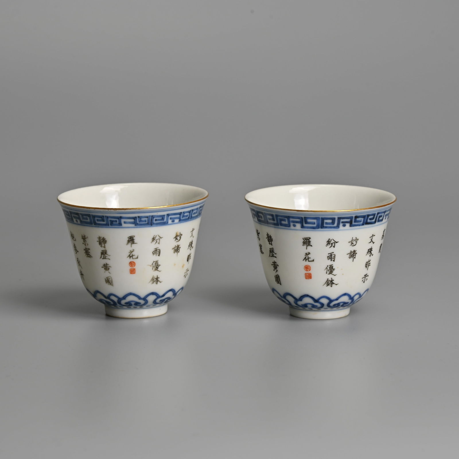 A PAIR OF CHINESE UNDERGLAZE BLUE AND INSCRIBED PORCELAIN WINE CUPS, 'TUI SI TANG ZHI', LATE QING / (1 of 7)