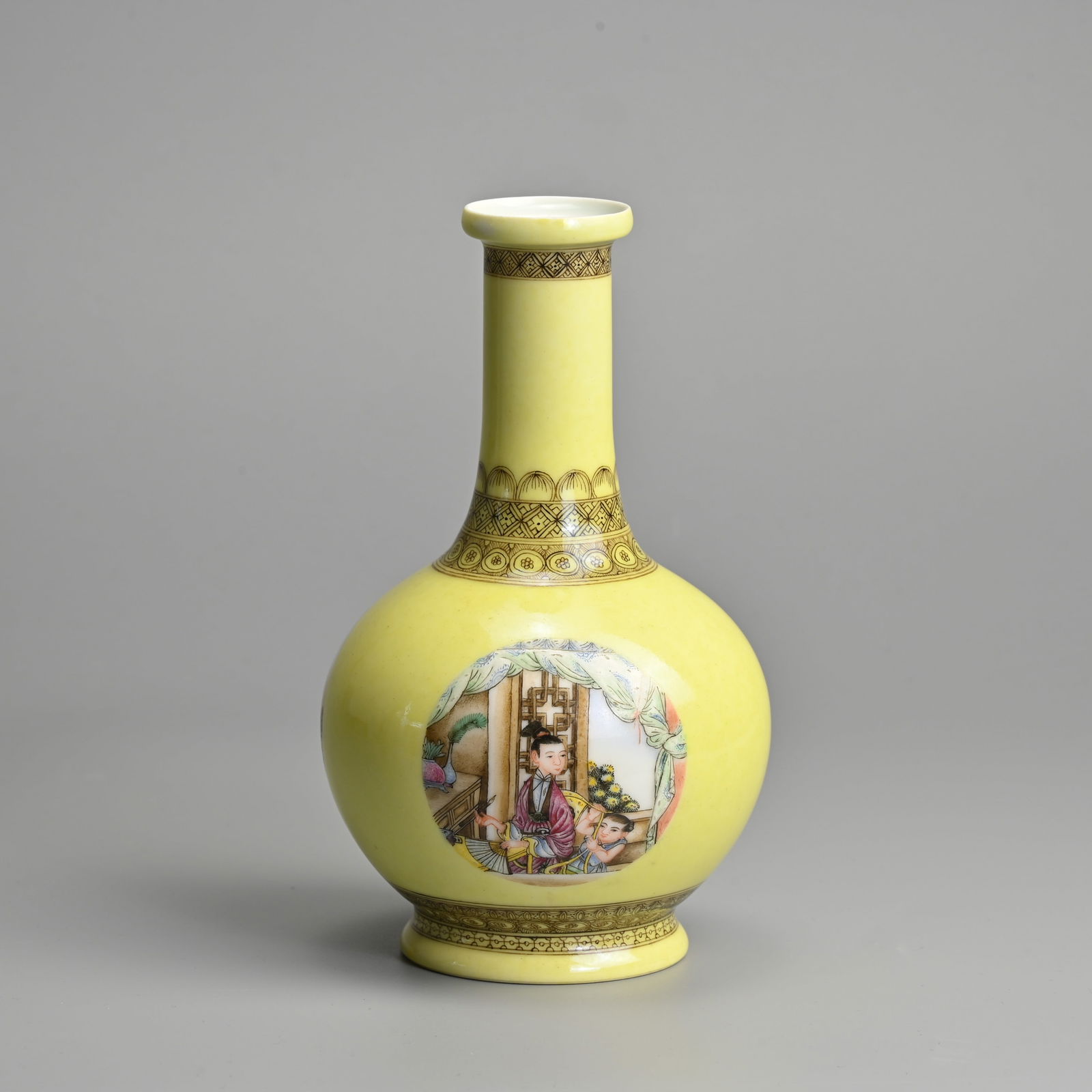 A CHINESE FAMILLE ROSE YELLOW-GROUND PORCELAIN BOTTLE VASE, 20TH CENTURY, REPUBLIC PERIOD. (1 of 6)