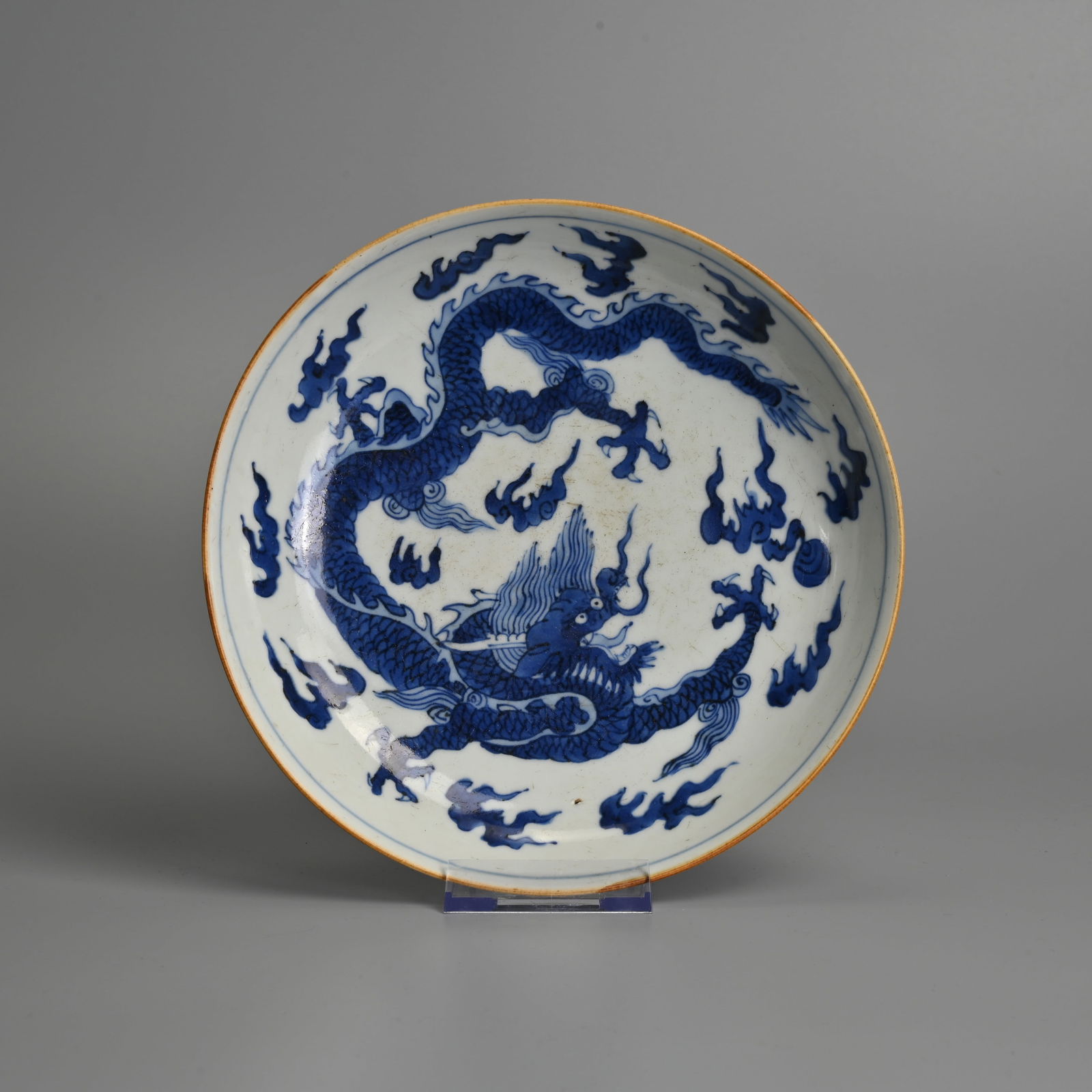 A CHINESE BLUE AND WHITE PORCELAIN 'DRAGON' DISH, 18TH CENTURY. (1 of 4)