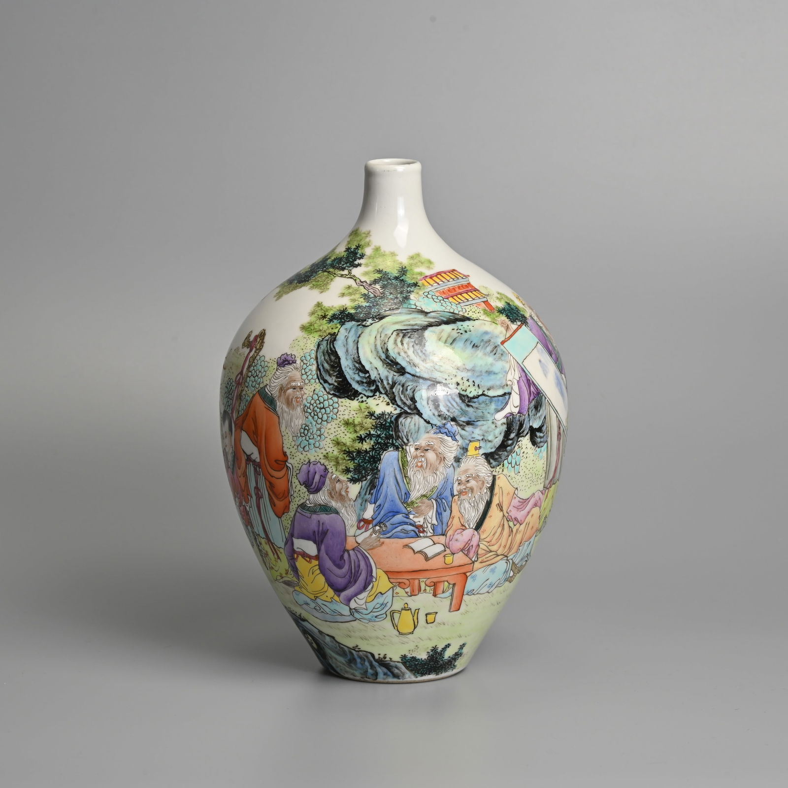 A CHINESE POLYCHROME DECORATED PORCELAIN 'SCHOLARS' VASE, 20TH CENTURY.: A CHINESE POLYCHROME DECORATED PORCELAIN 'SCHOLARS' VASE, 20TH CENTURY. Of ovoid form decorated with various scholars and children in a landscape scene, in conversation and looking at a scroll. Four-c