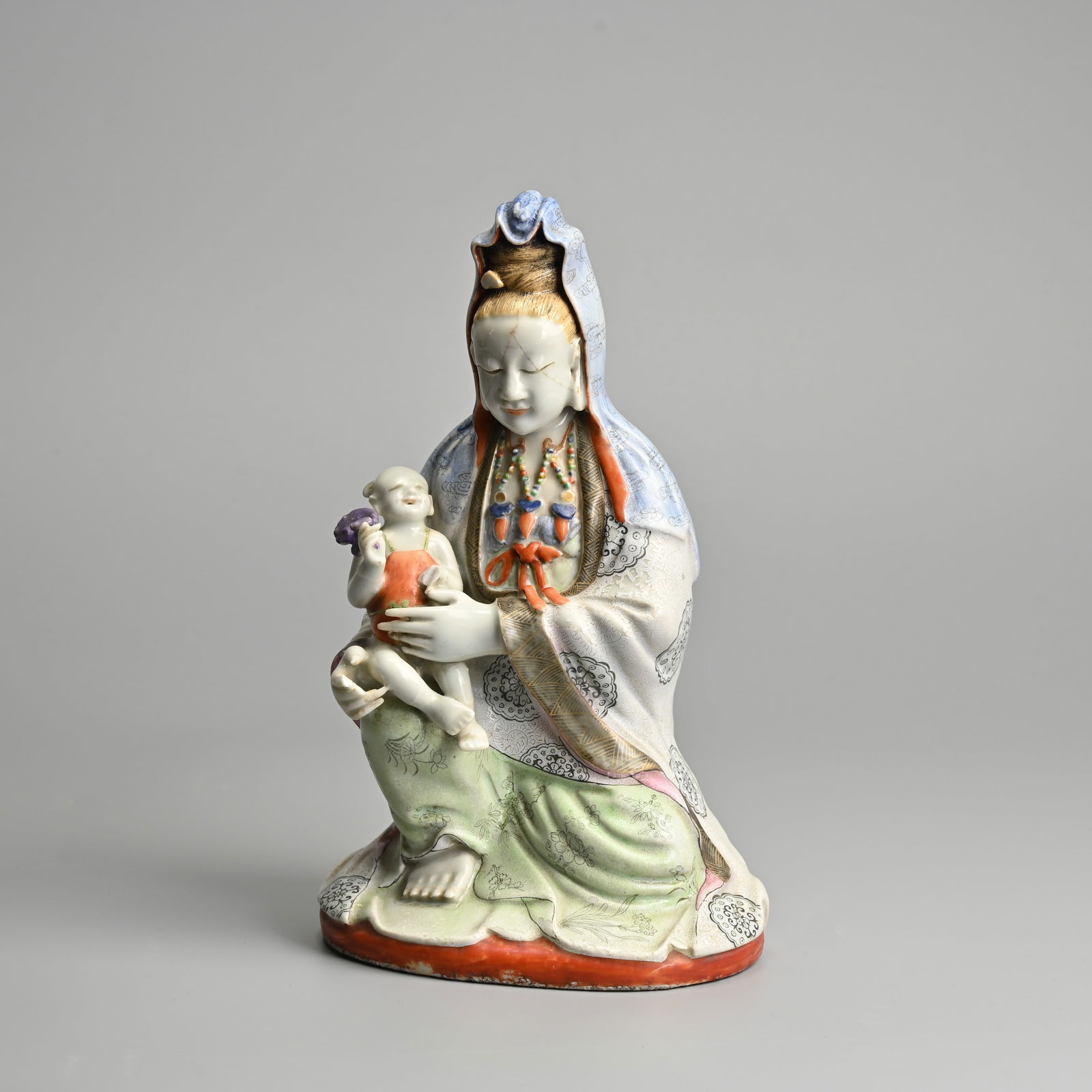 A CHINESE FAMILLE ROSE PORCELAIN MODEL OF GUANYIN, QING DYNASTY. (1 of 11)